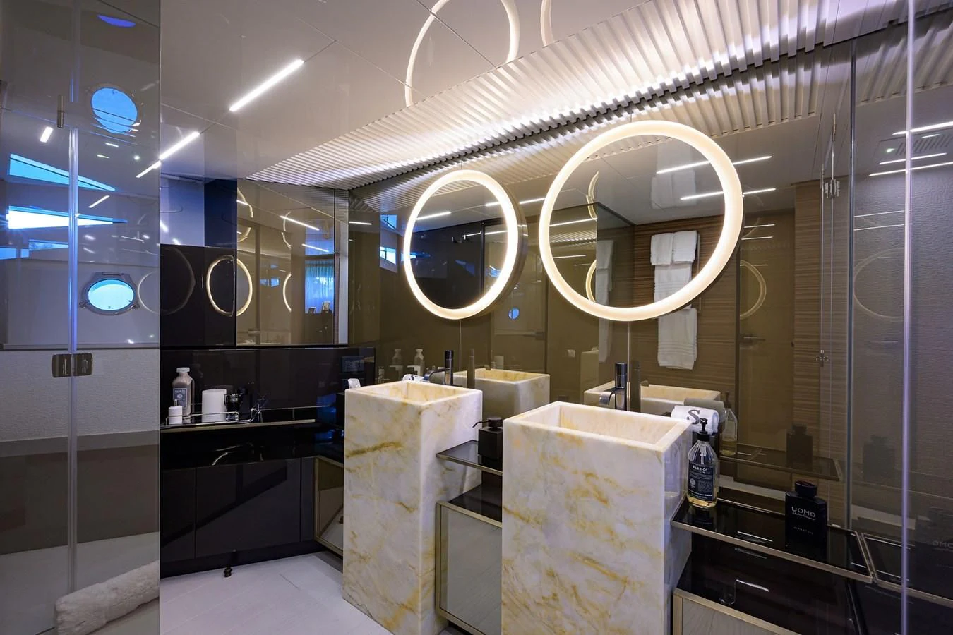a bathroom with a large mirror aboard DATE NIGHT Yacht for Sale