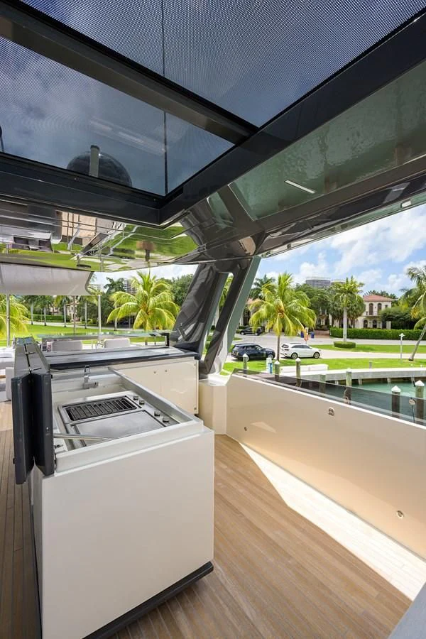 a kitchen with a large window aboard DATE NIGHT Yacht for Sale