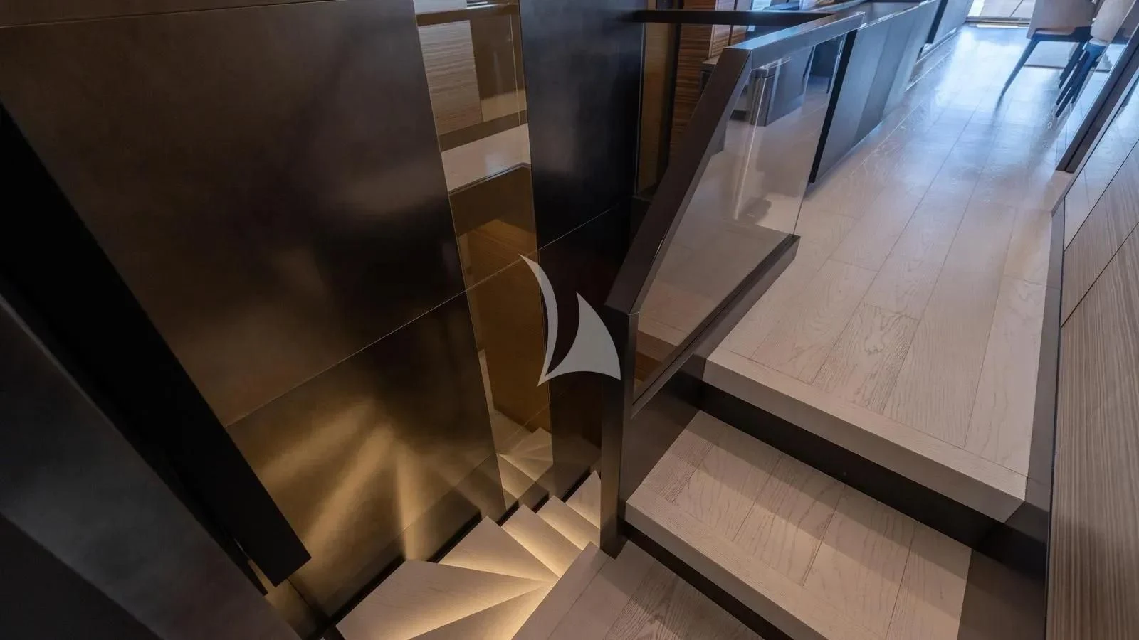 a wooden staircase with a glass door aboard DATE NIGHT Yacht for Sale