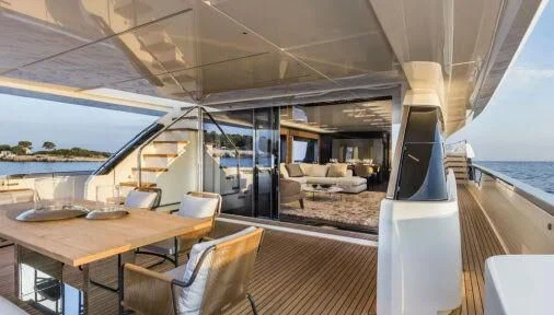 a table and chairs on a boat aboard DATE NIGHT Yacht for Sale
