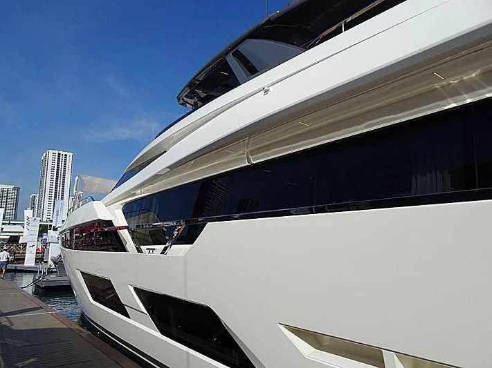 a yacht docked at a pier aboard DATE NIGHT Yacht for Sale