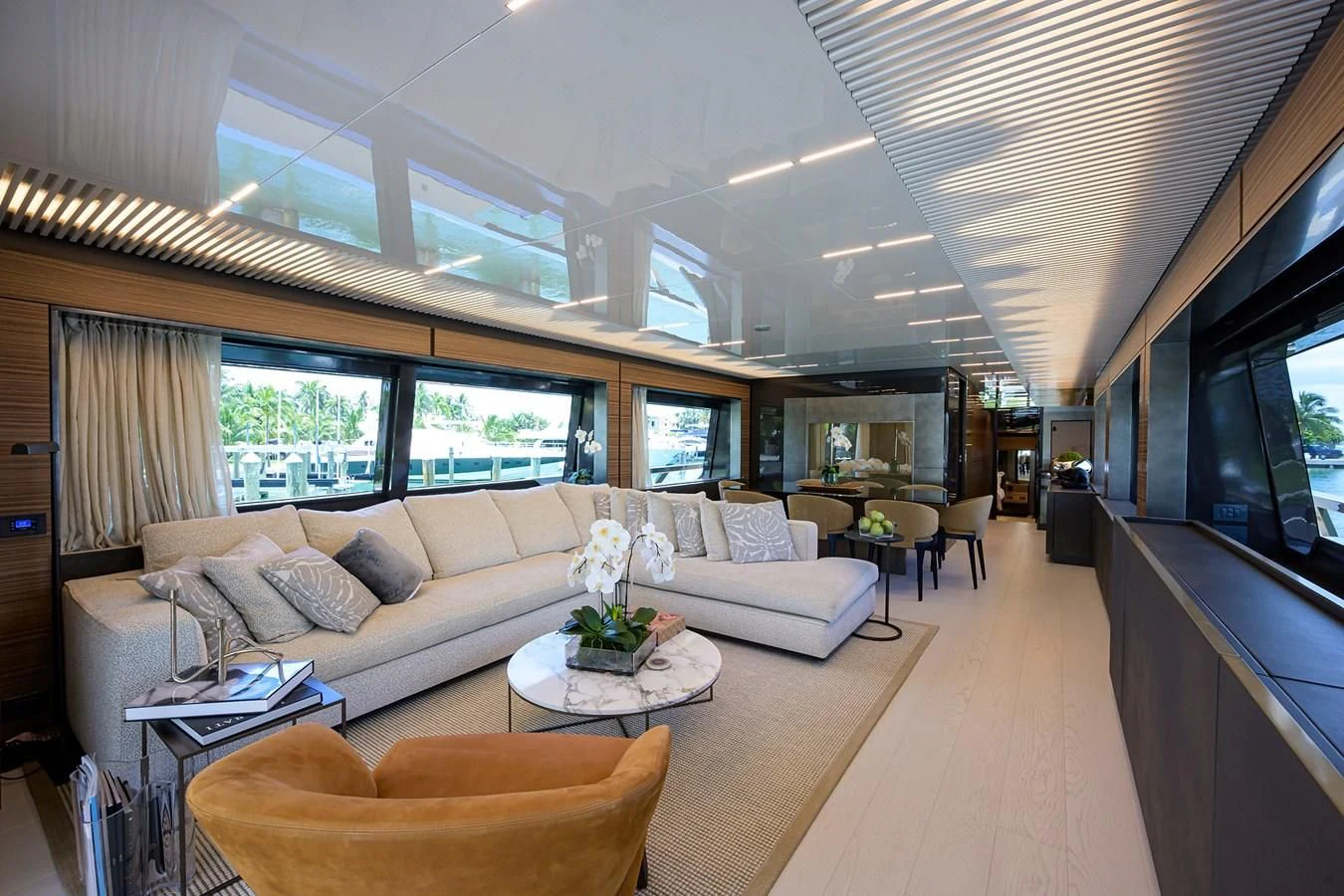 a living room with a large window aboard DATE NIGHT Yacht for Sale
