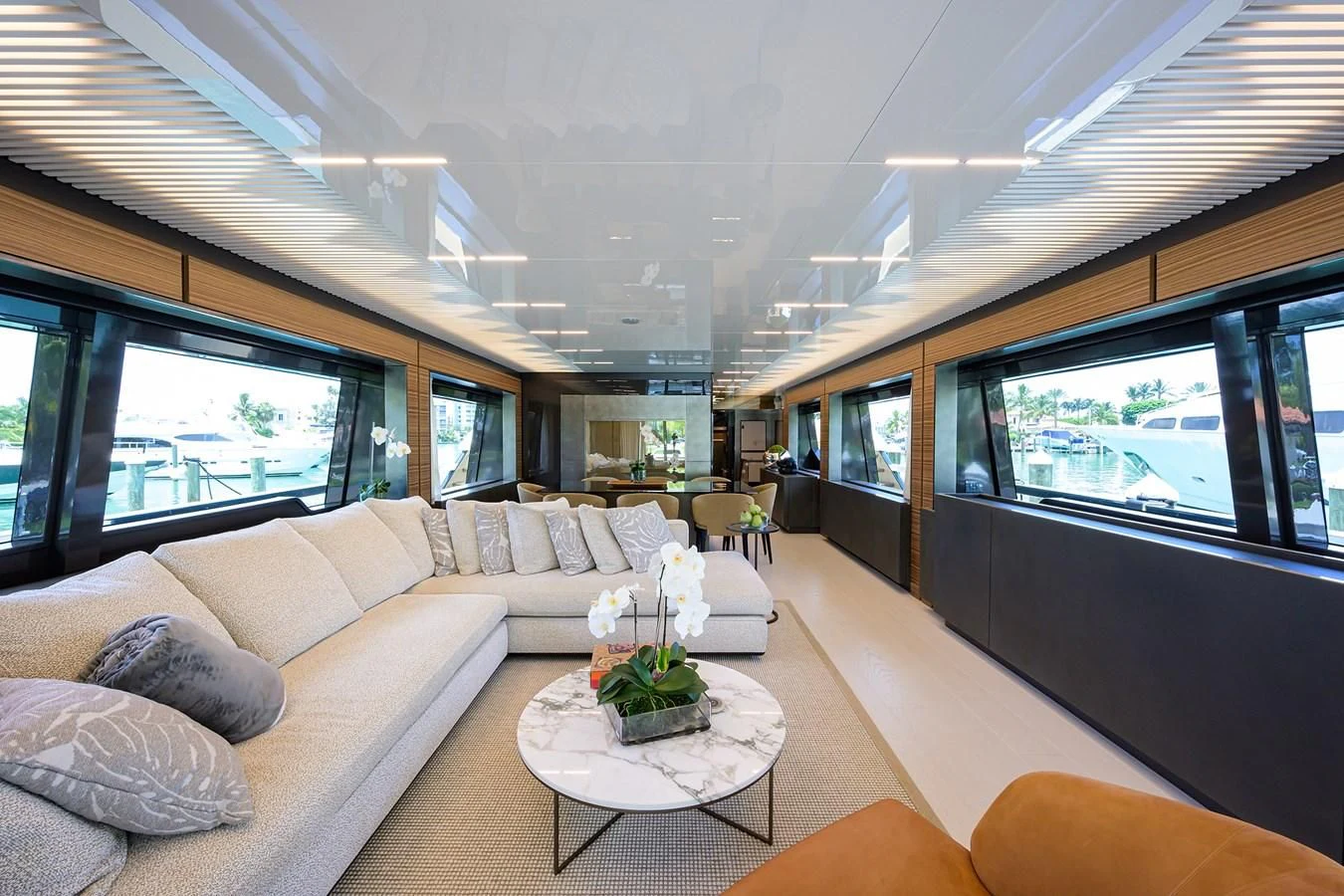 a living room with a couch and a coffee table aboard DATE NIGHT Yacht for Sale