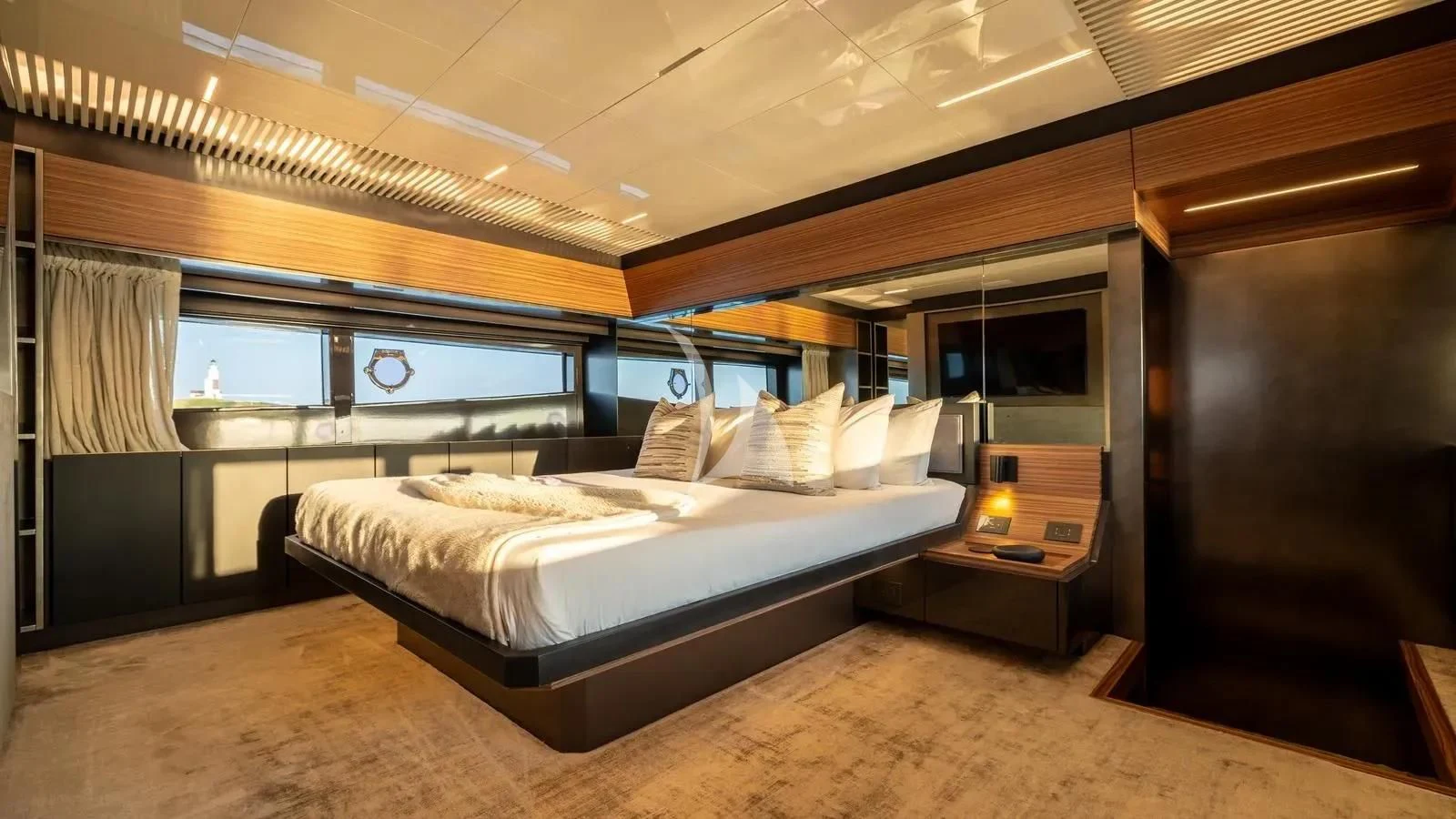 a large bed in a room aboard DATE NIGHT Yacht for Sale