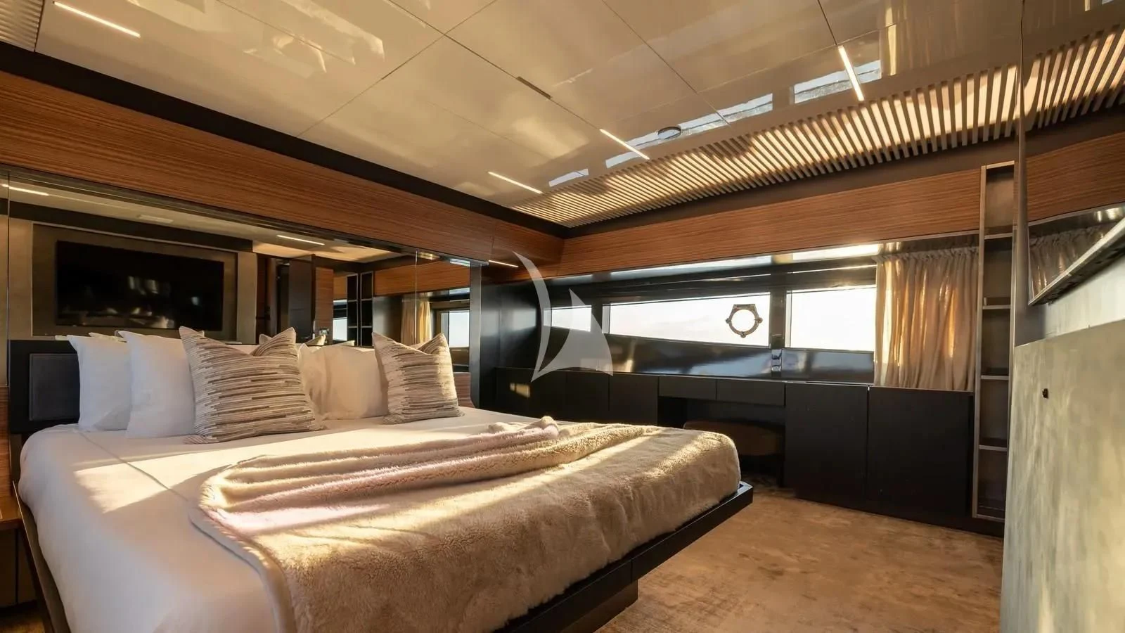 a large bed in a room aboard DATE NIGHT Yacht for Sale
