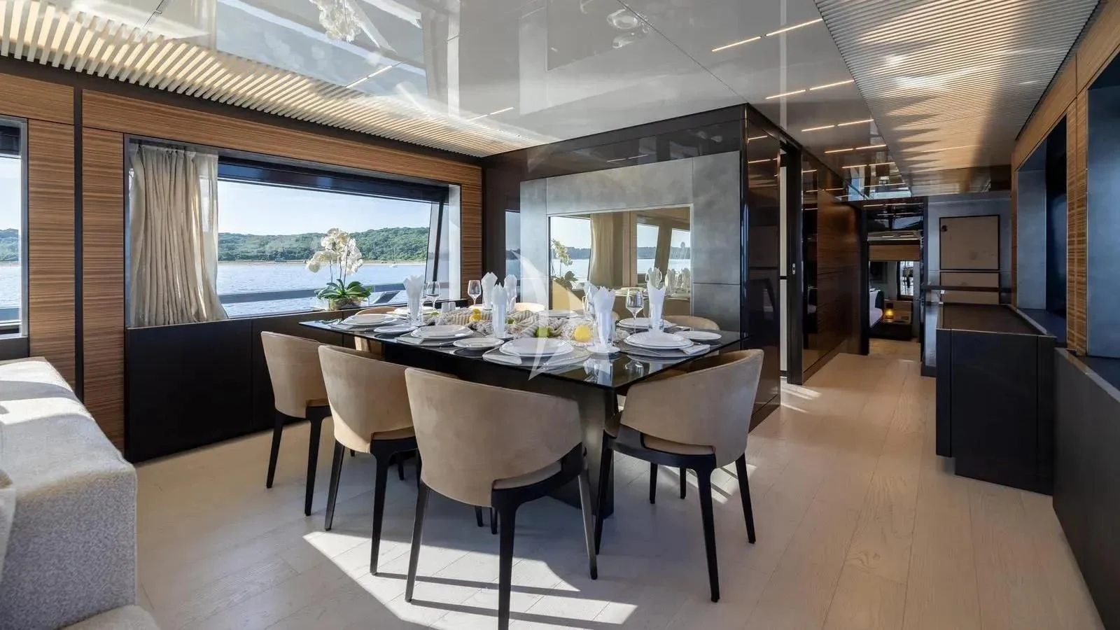 a large dining table in a room aboard DATE NIGHT Yacht for Sale