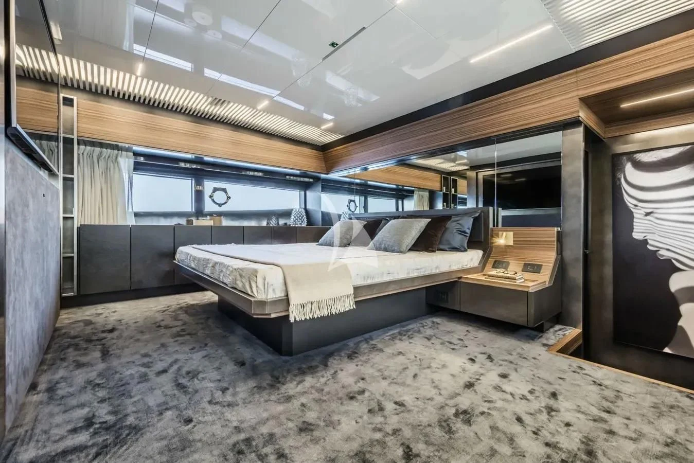 a room with a bed and a desk aboard DATE NIGHT Yacht for Sale