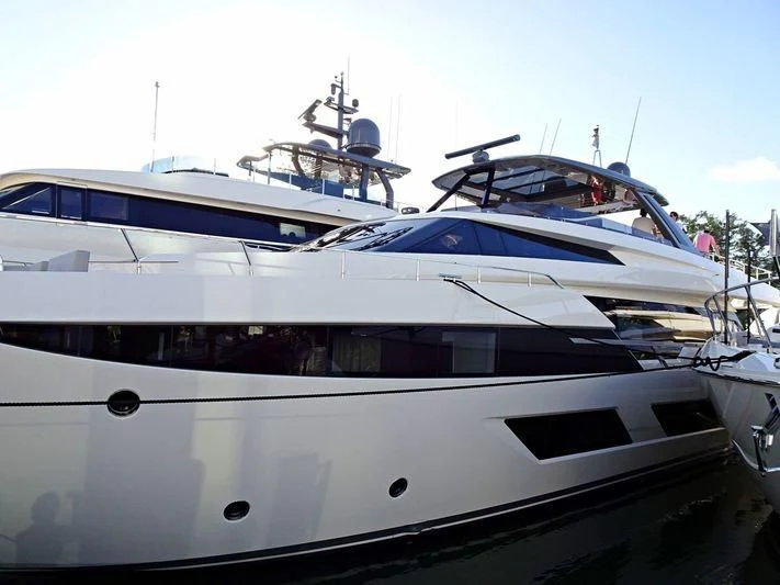 a white yacht with blue trim aboard DATE NIGHT Yacht for Sale