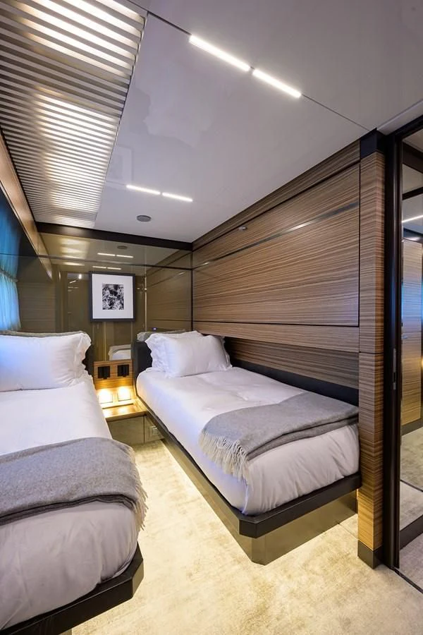 a room with two beds aboard DATE NIGHT Yacht for Sale