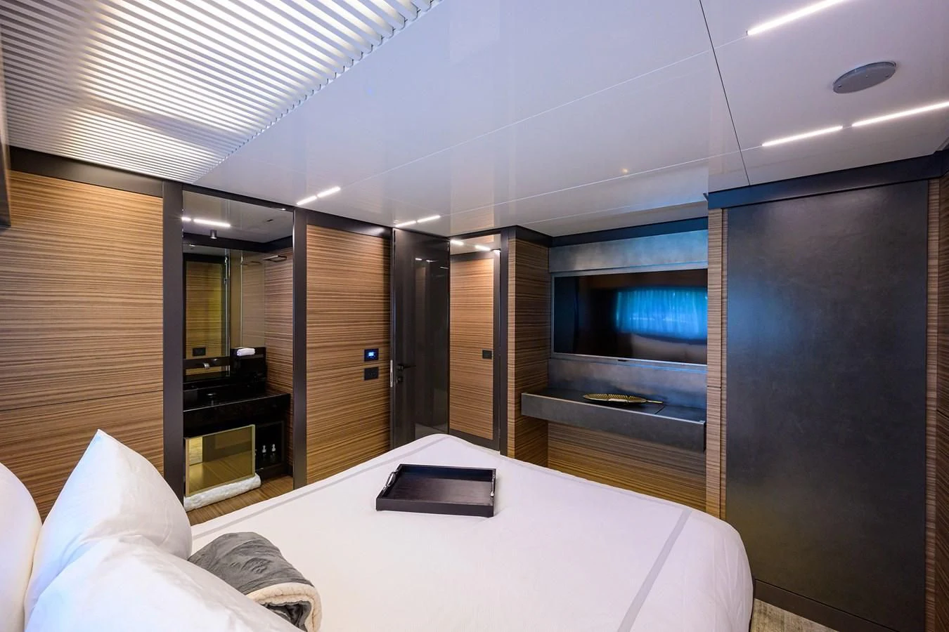 a room with a desk and a bed aboard DATE NIGHT Yacht for Sale