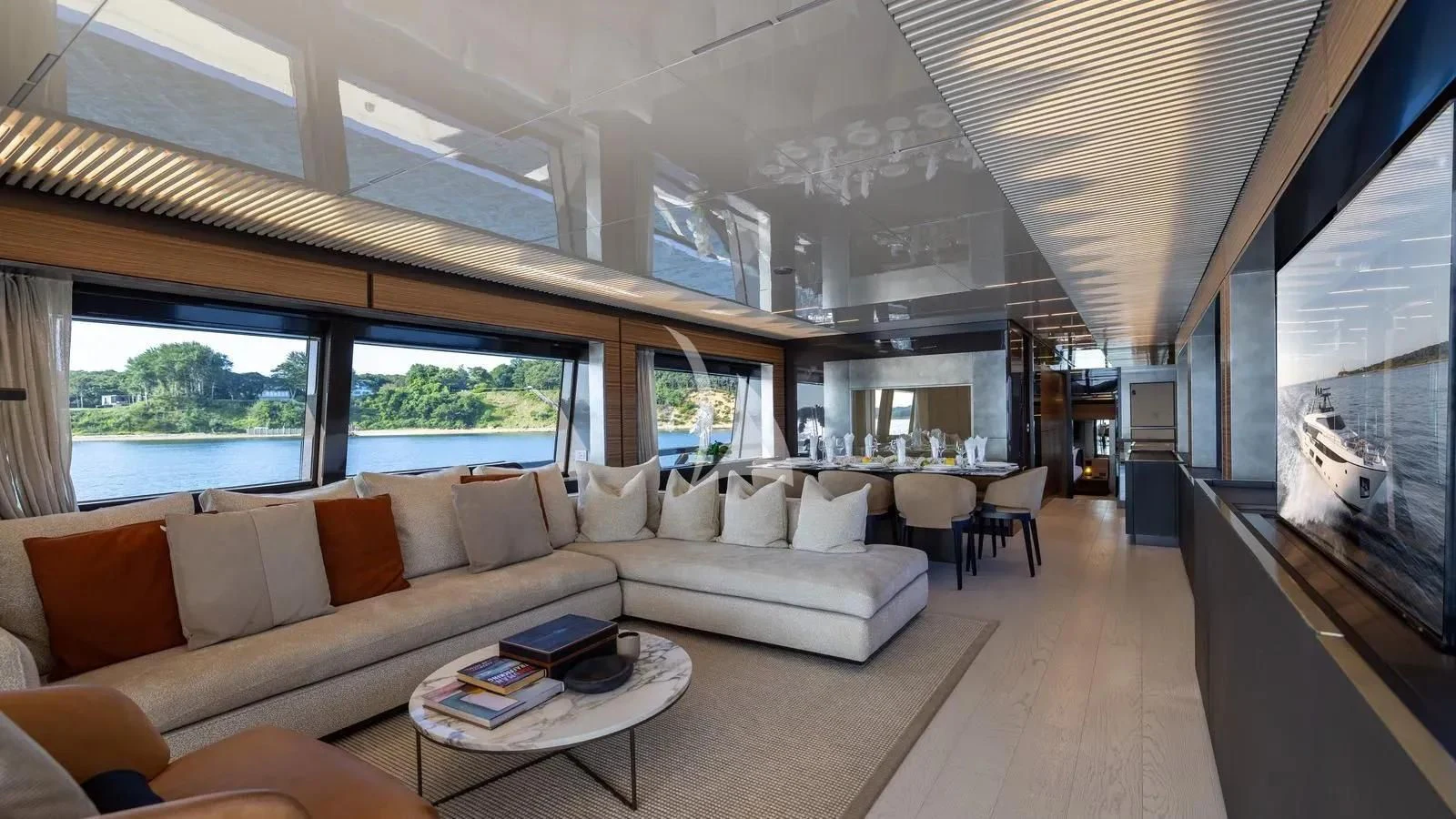 a living room with a large window aboard DATE NIGHT Yacht for Sale