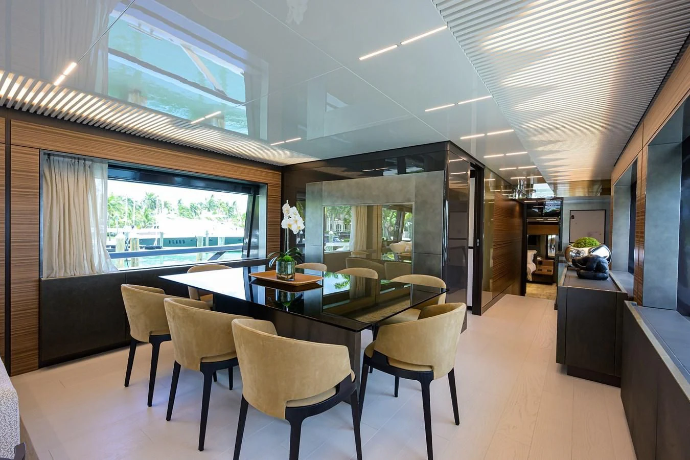 a room with a table and chairs aboard DATE NIGHT Yacht for Sale