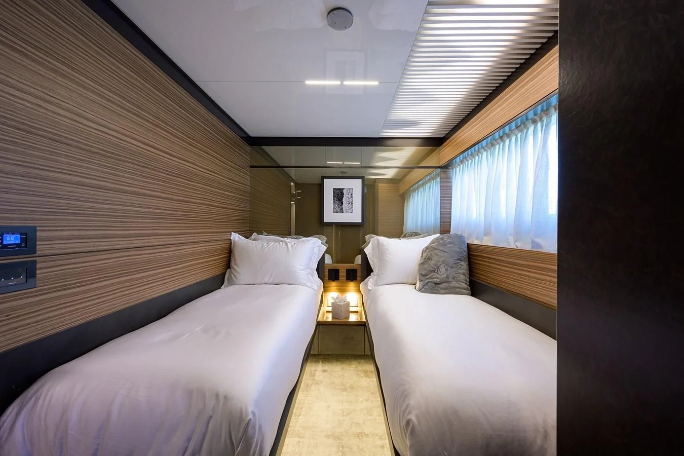 a room with two beds aboard DATE NIGHT Yacht for Sale