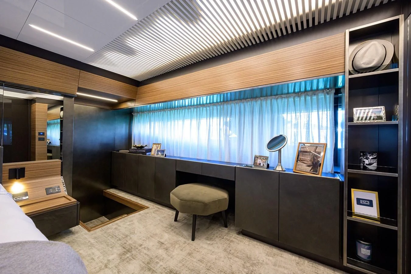 a room with a desk and a window aboard DATE NIGHT Yacht for Sale