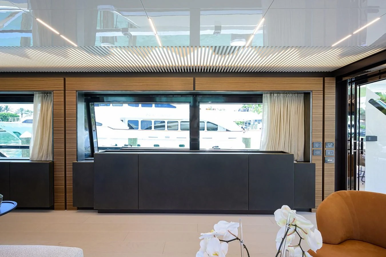 a large tv in a room aboard DATE NIGHT Yacht for Sale