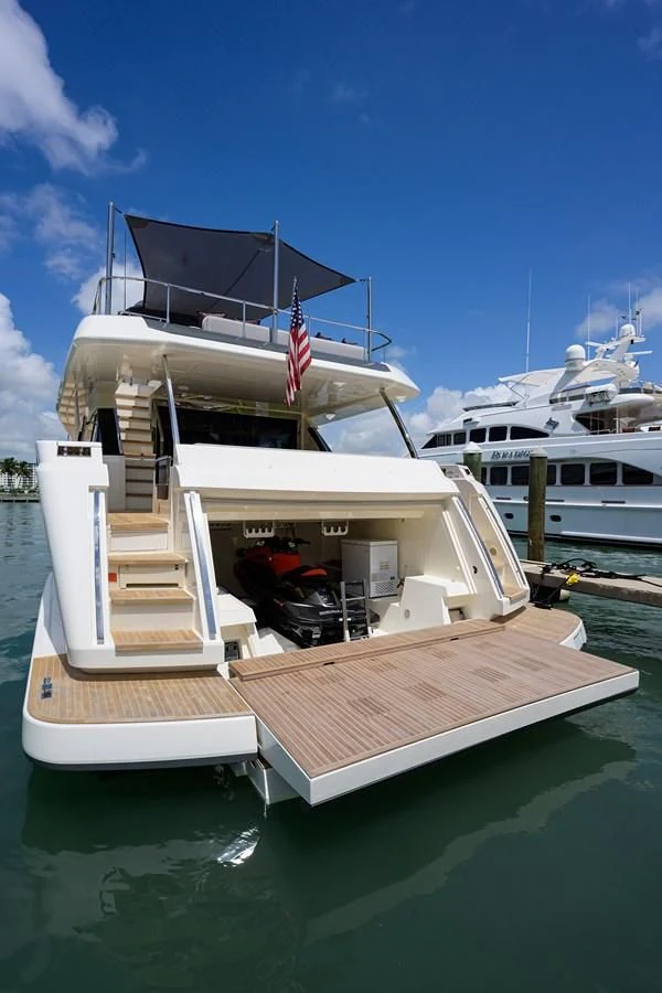 a boat docked at a pier aboard DATE NIGHT Yacht for Sale