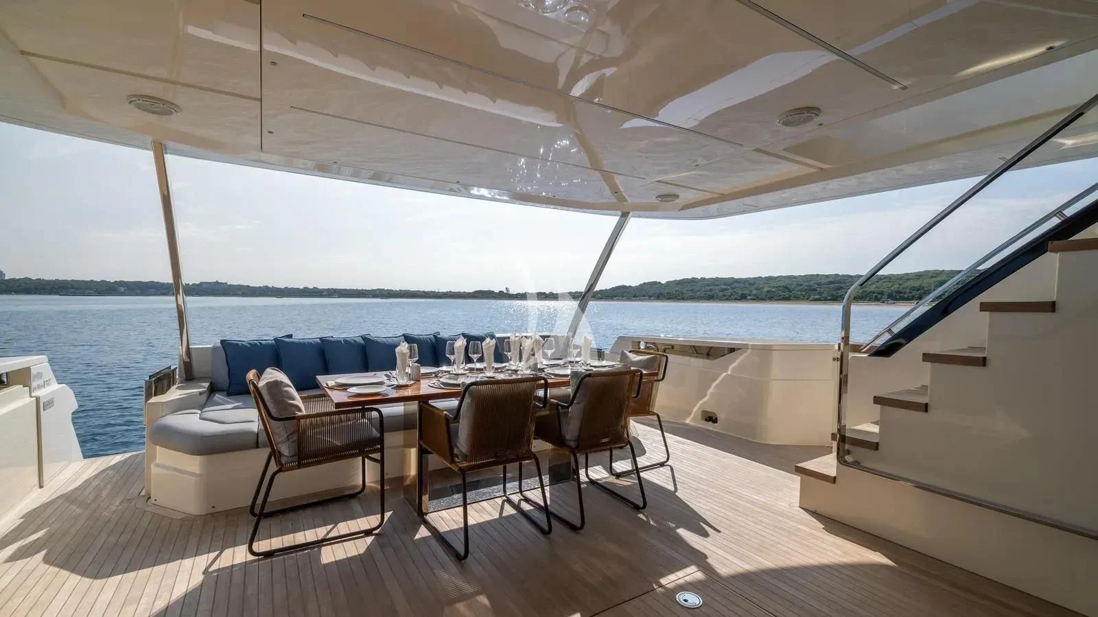 a room with a table and chairs aboard DATE NIGHT Yacht for Sale