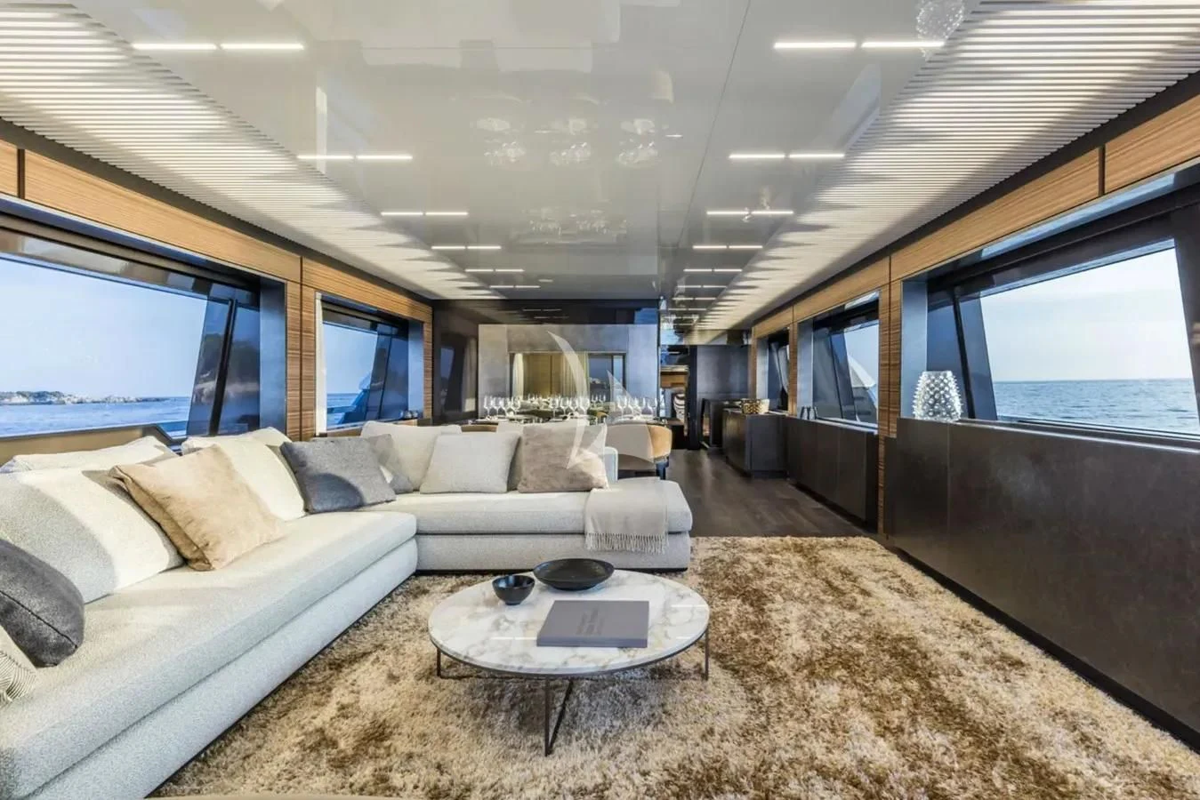 a living room with a couch and a table aboard DATE NIGHT Yacht for Sale