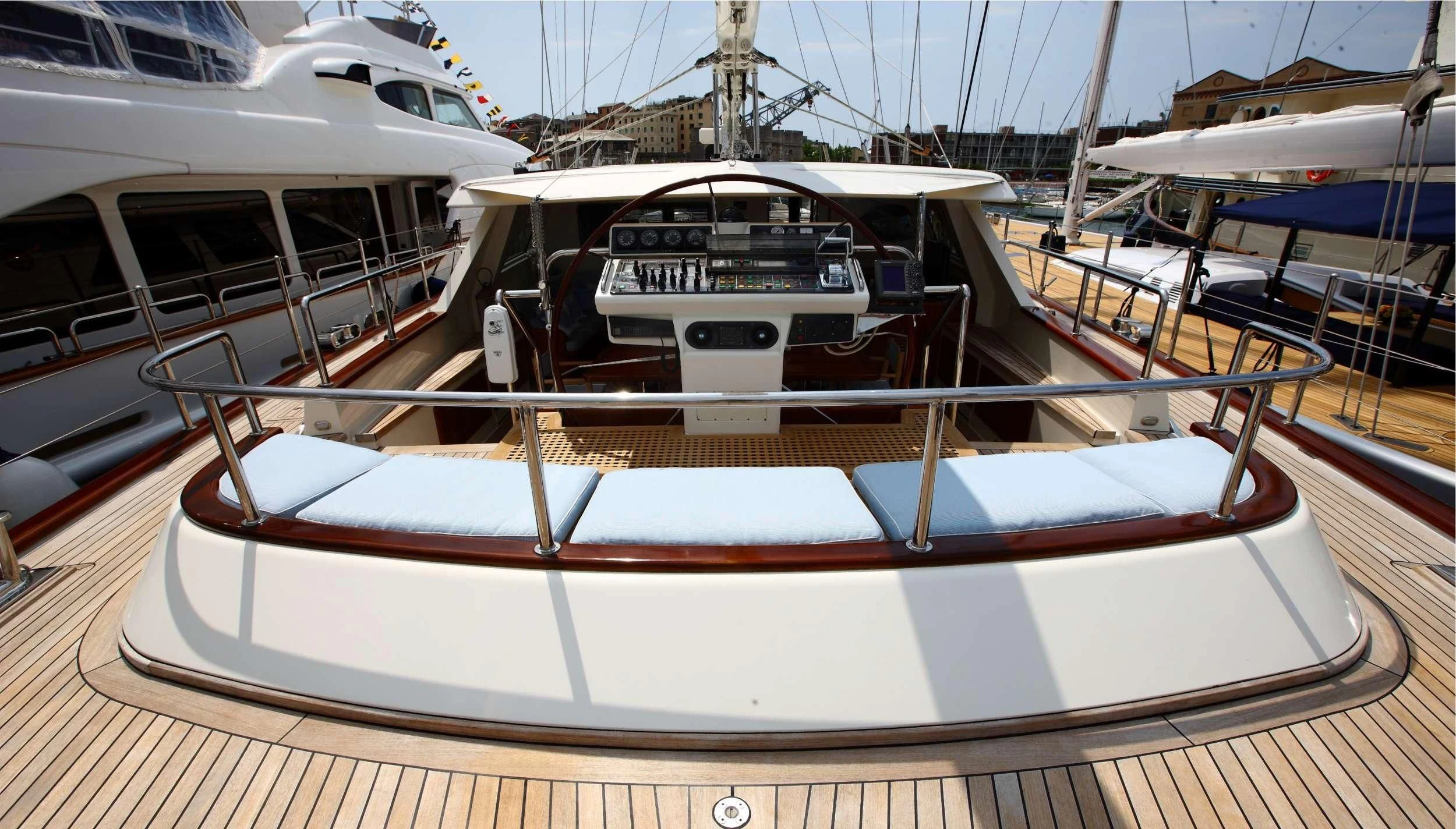 a boat in a harbor aboard HERITAGE M Yacht for Charter