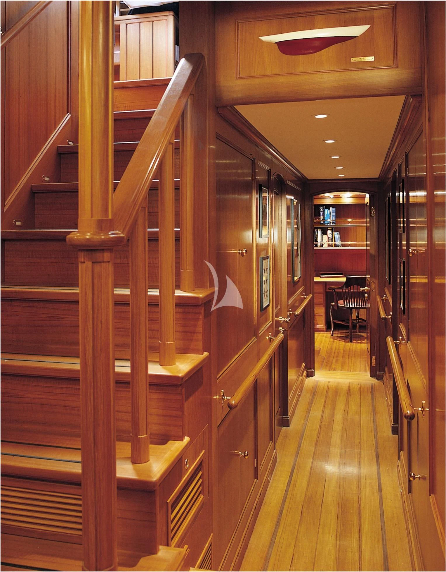 a wooden staircase in a building aboard HERITAGE M Yacht for Charter