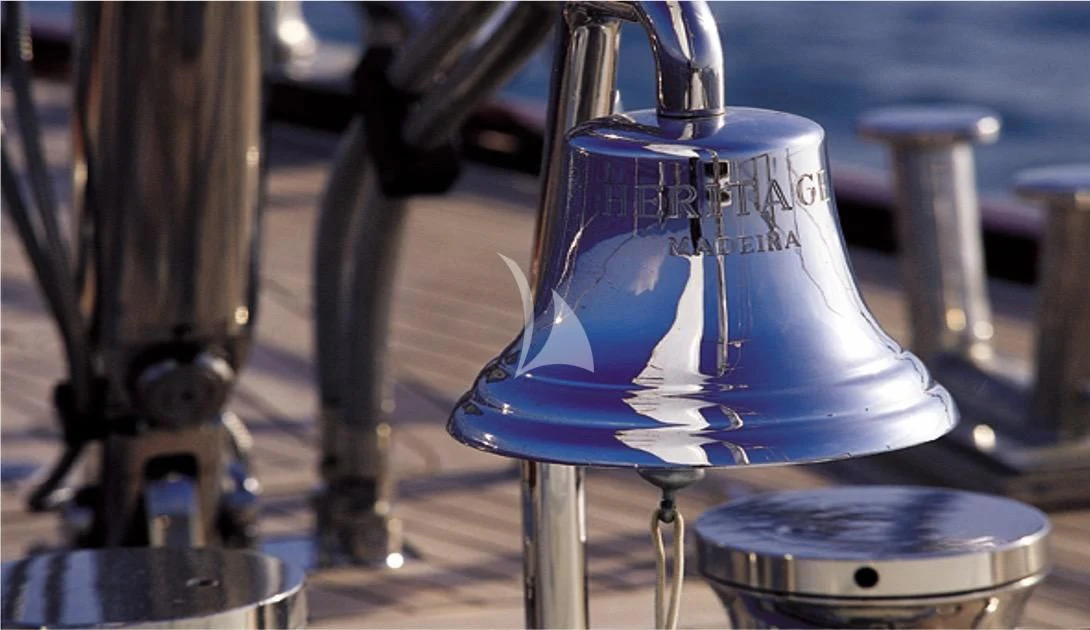 a glass of liquid aboard HERITAGE M Yacht for Charter