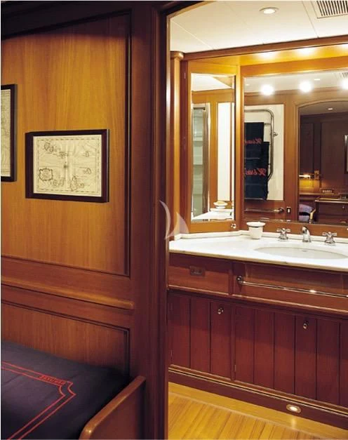 a bathroom with a sink and a mirror aboard HERITAGE M Yacht for Charter