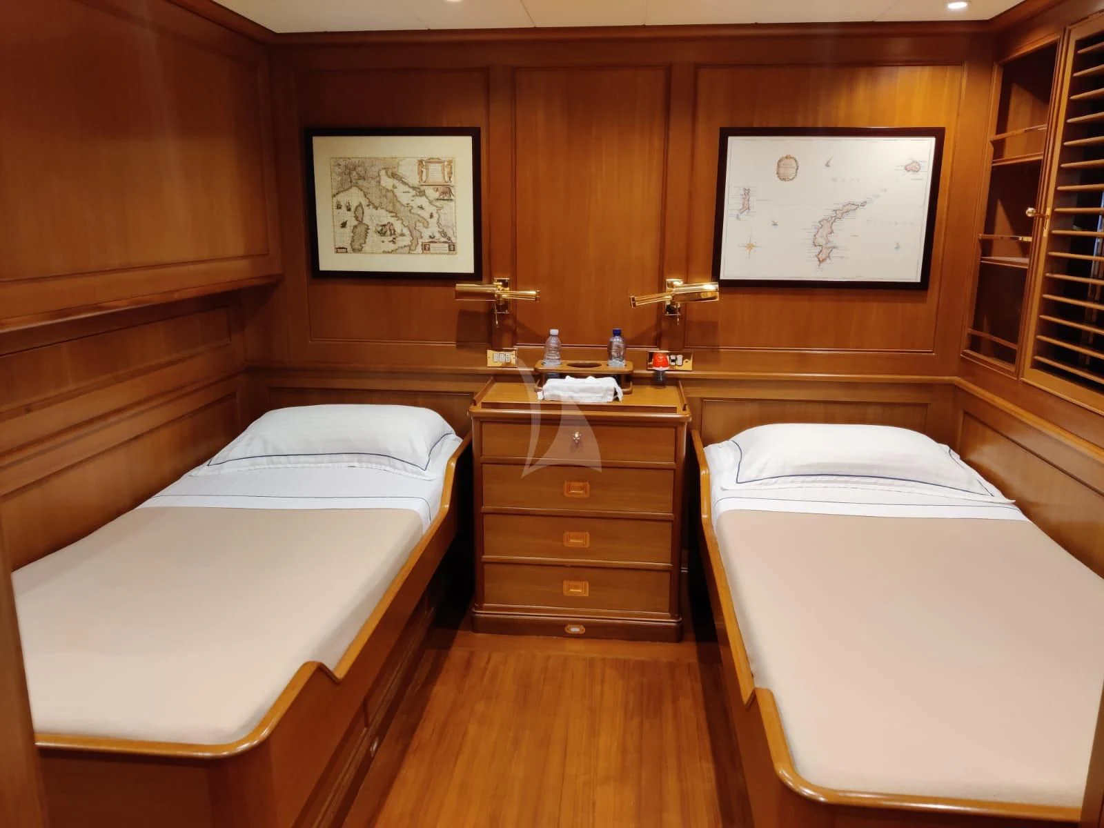a room with two beds aboard HERITAGE M Yacht for Charter