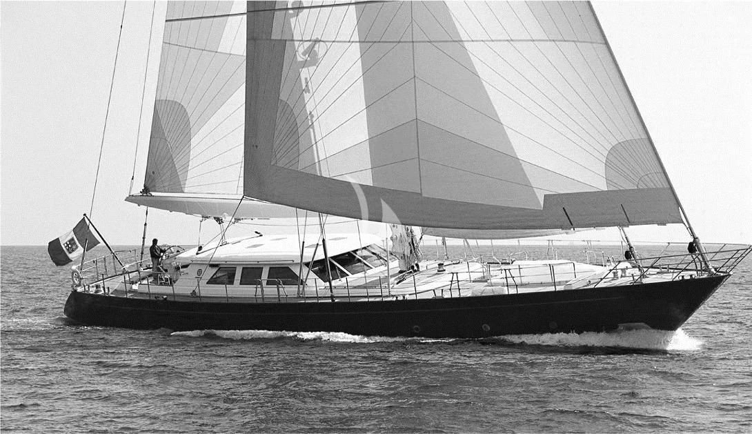 a black and white photo of a boat on the water aboard HERITAGE M Yacht for Charter