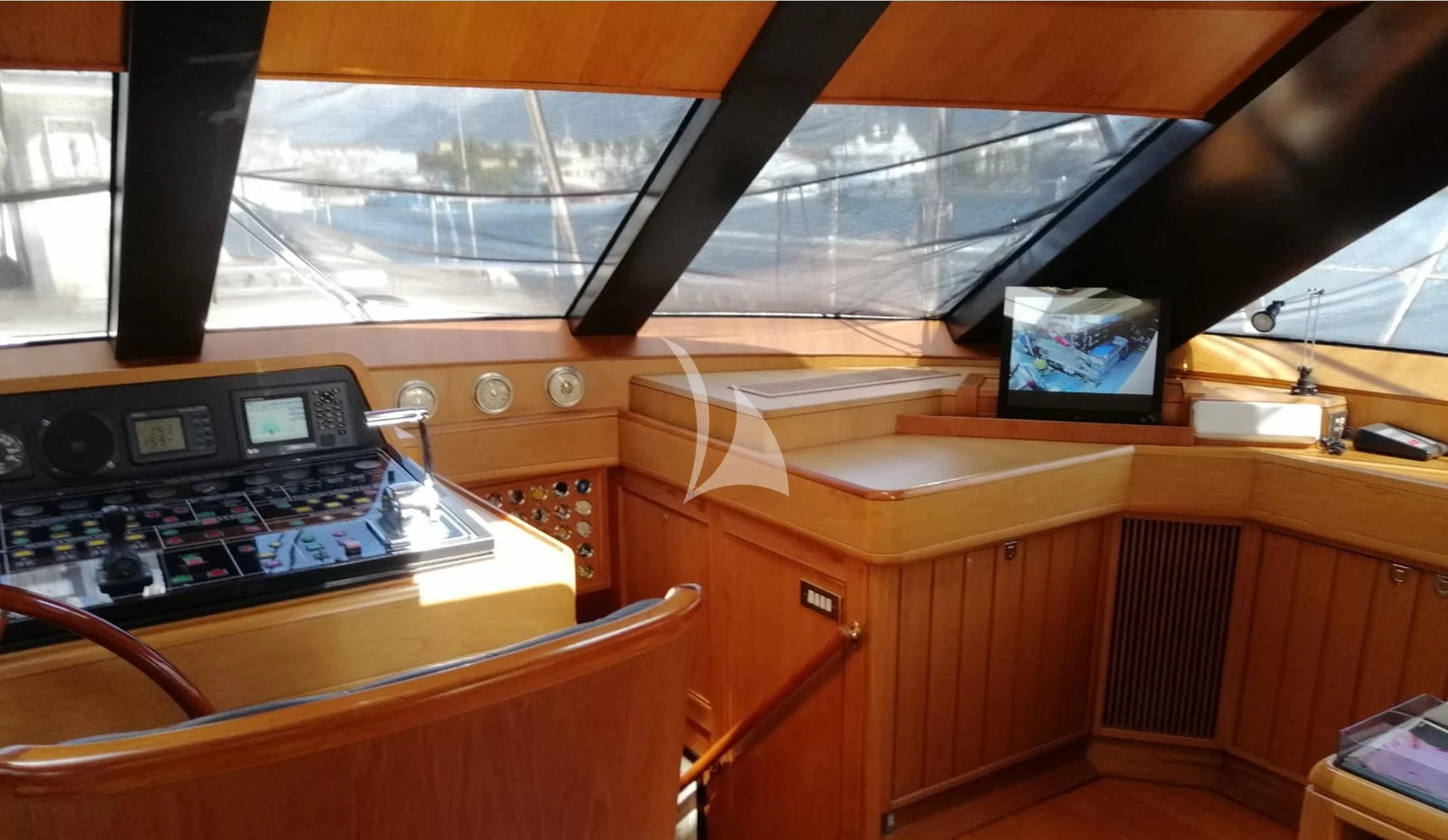 a room with a desk and a window aboard HERITAGE M Yacht for Charter