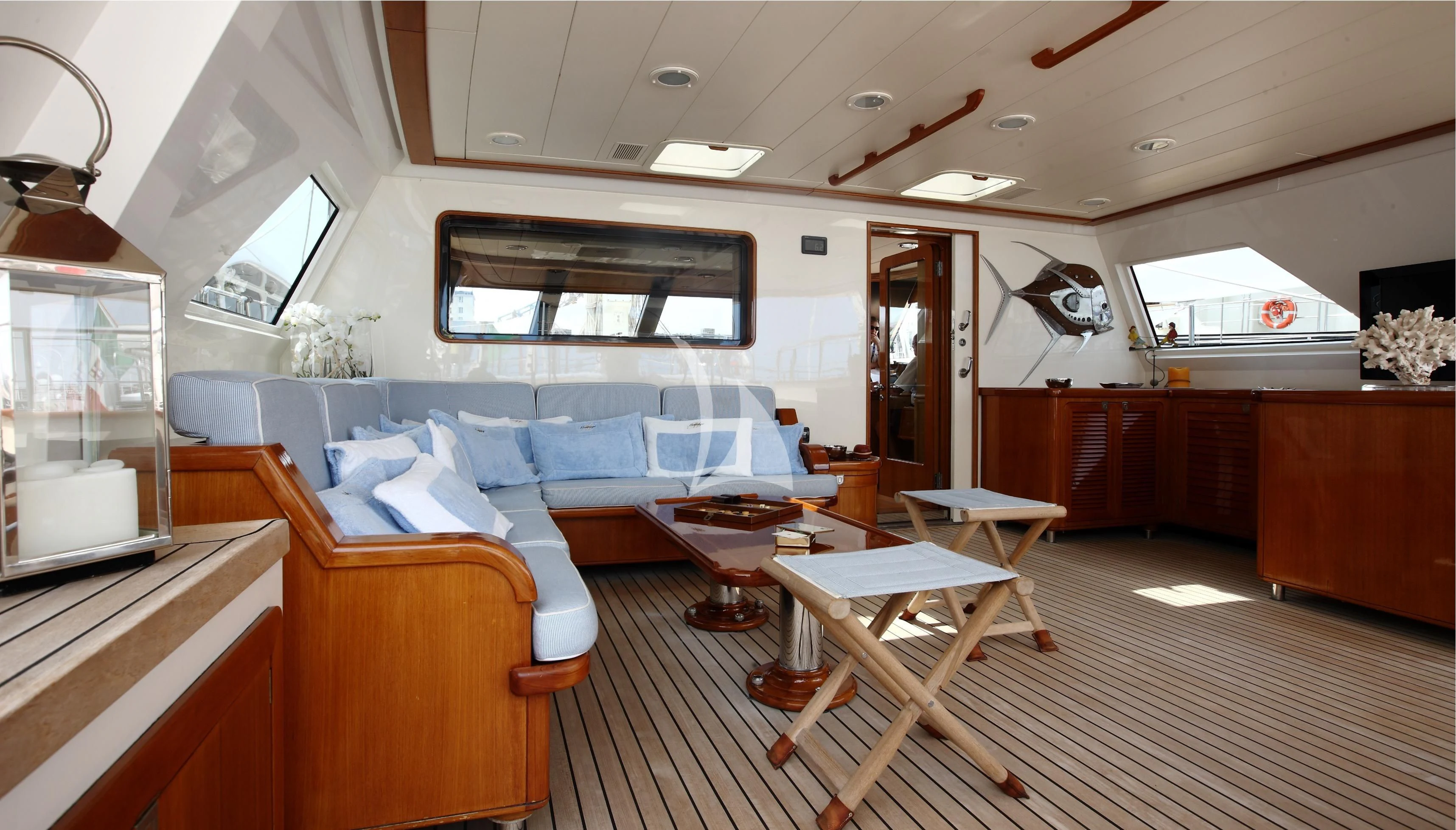 a room with a couch and a table aboard HERITAGE M Yacht for Charter