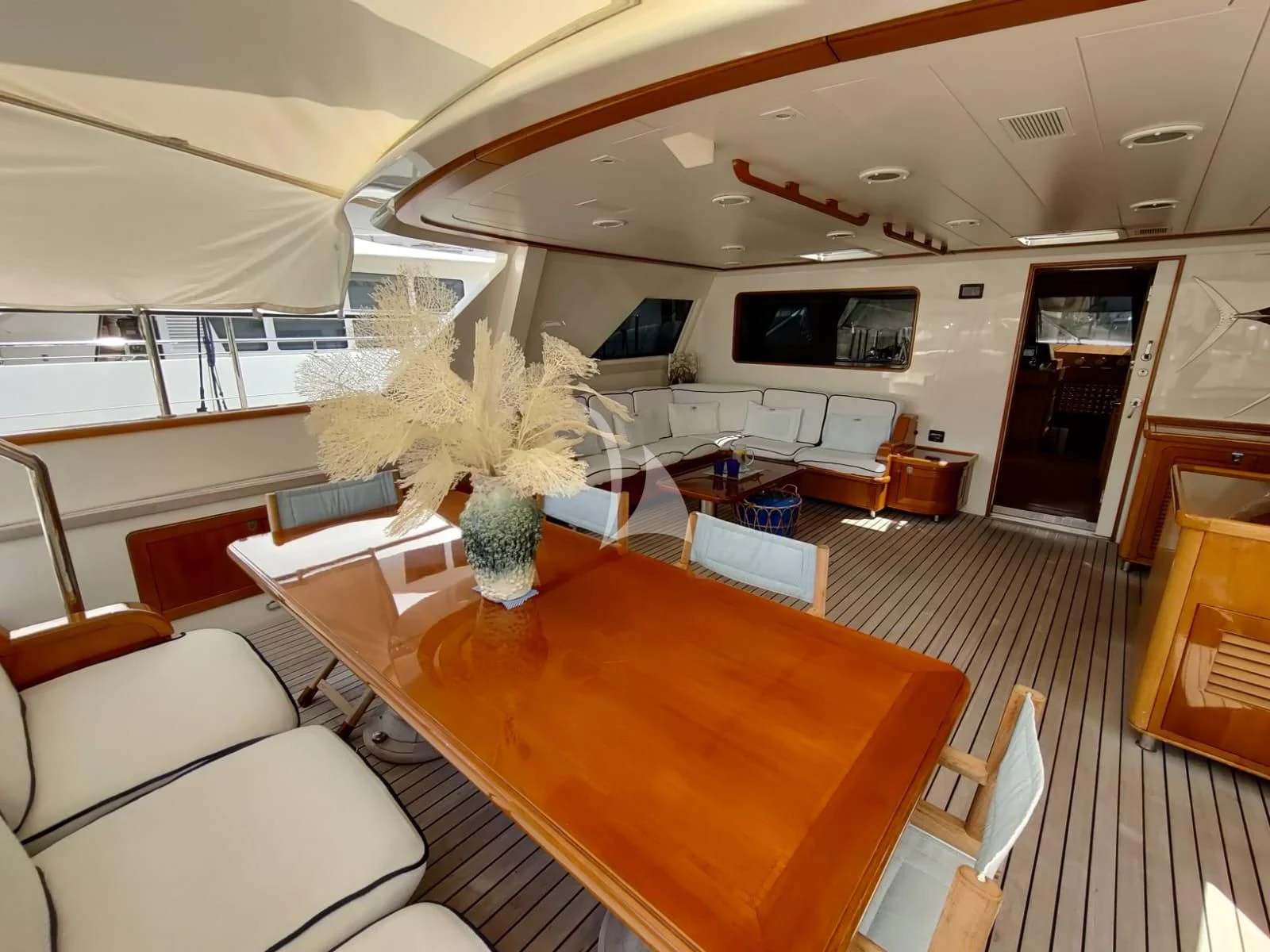a room with a table and chairs aboard HERITAGE M Yacht for Charter