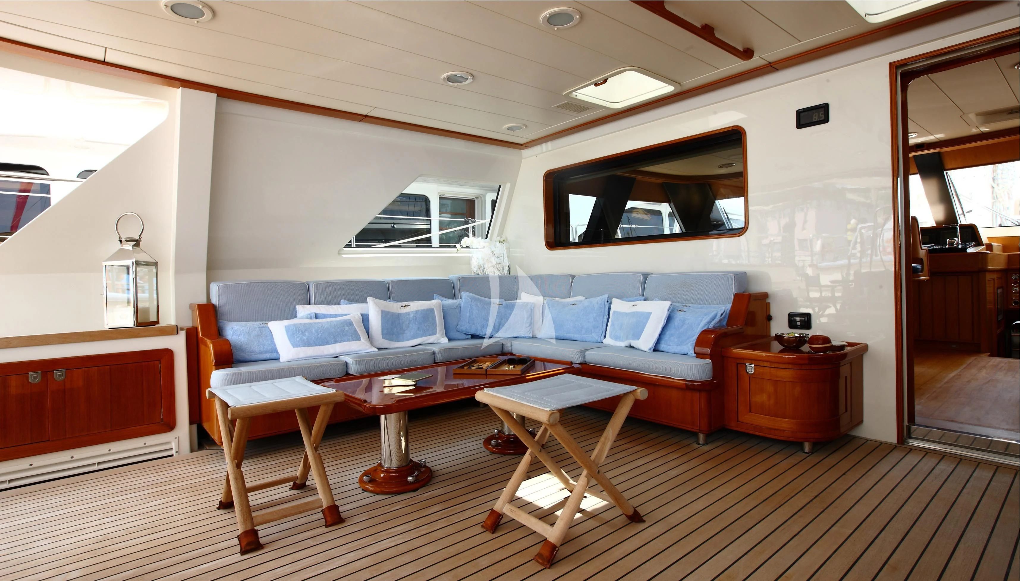 a living room with a couch and a table aboard HERITAGE M Yacht for Charter