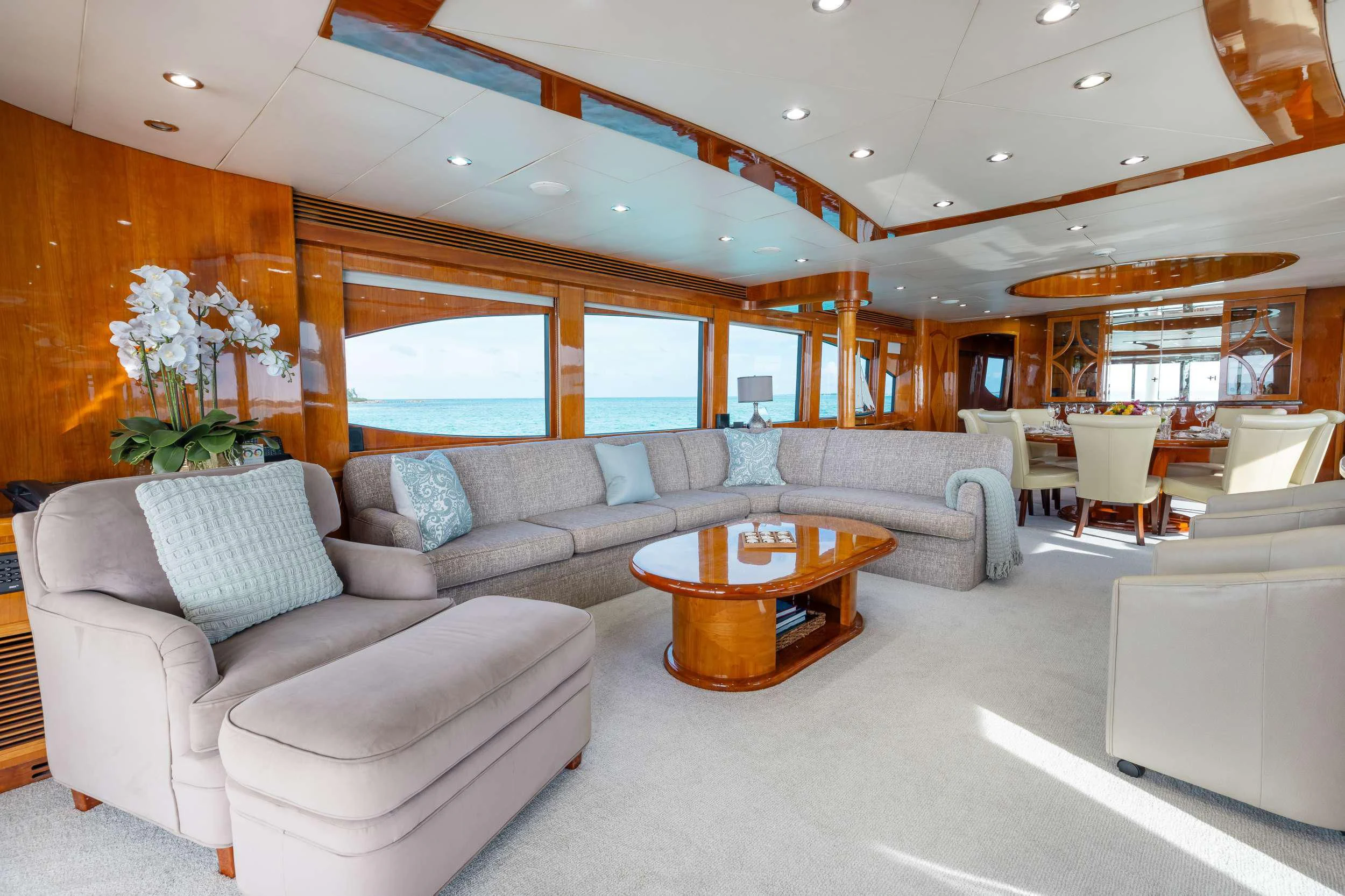 a living room with a couch and a coffee table aboard VITESSE Yacht for Sale