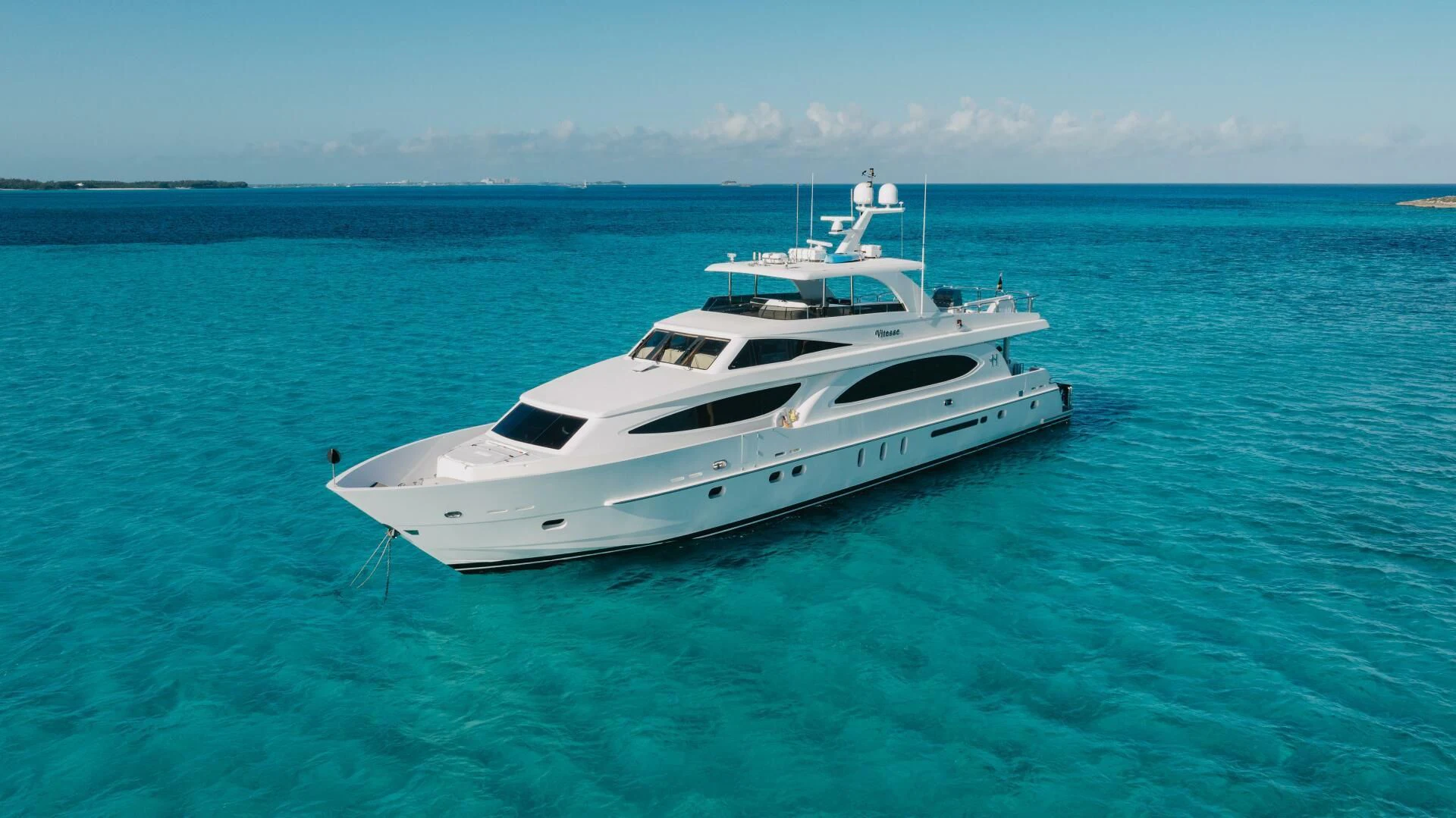 a white yacht in the water aboard VITESSE Yacht for Sale