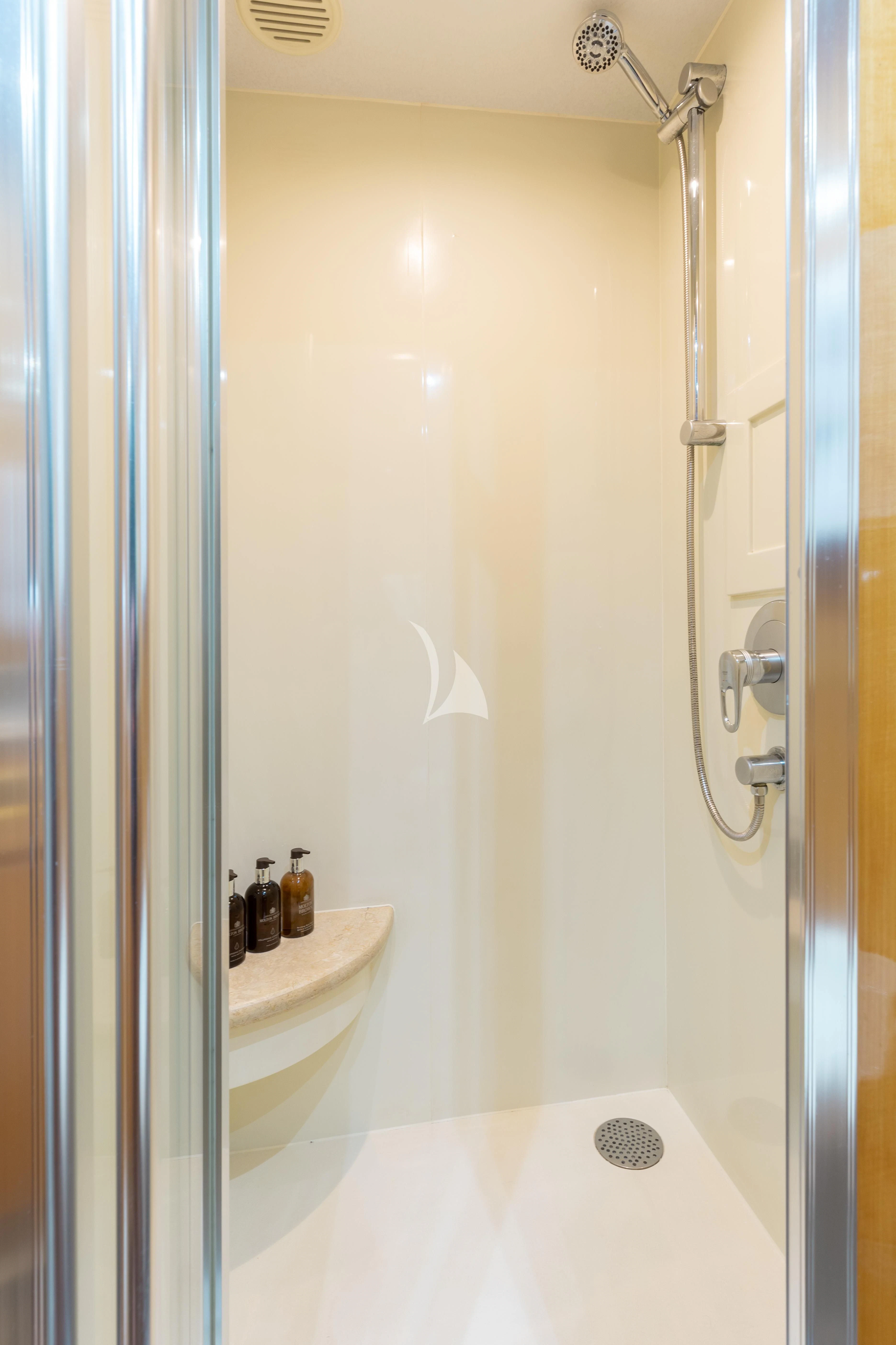 a bathroom with a bathtub and sink aboard VITESSE Yacht for Sale