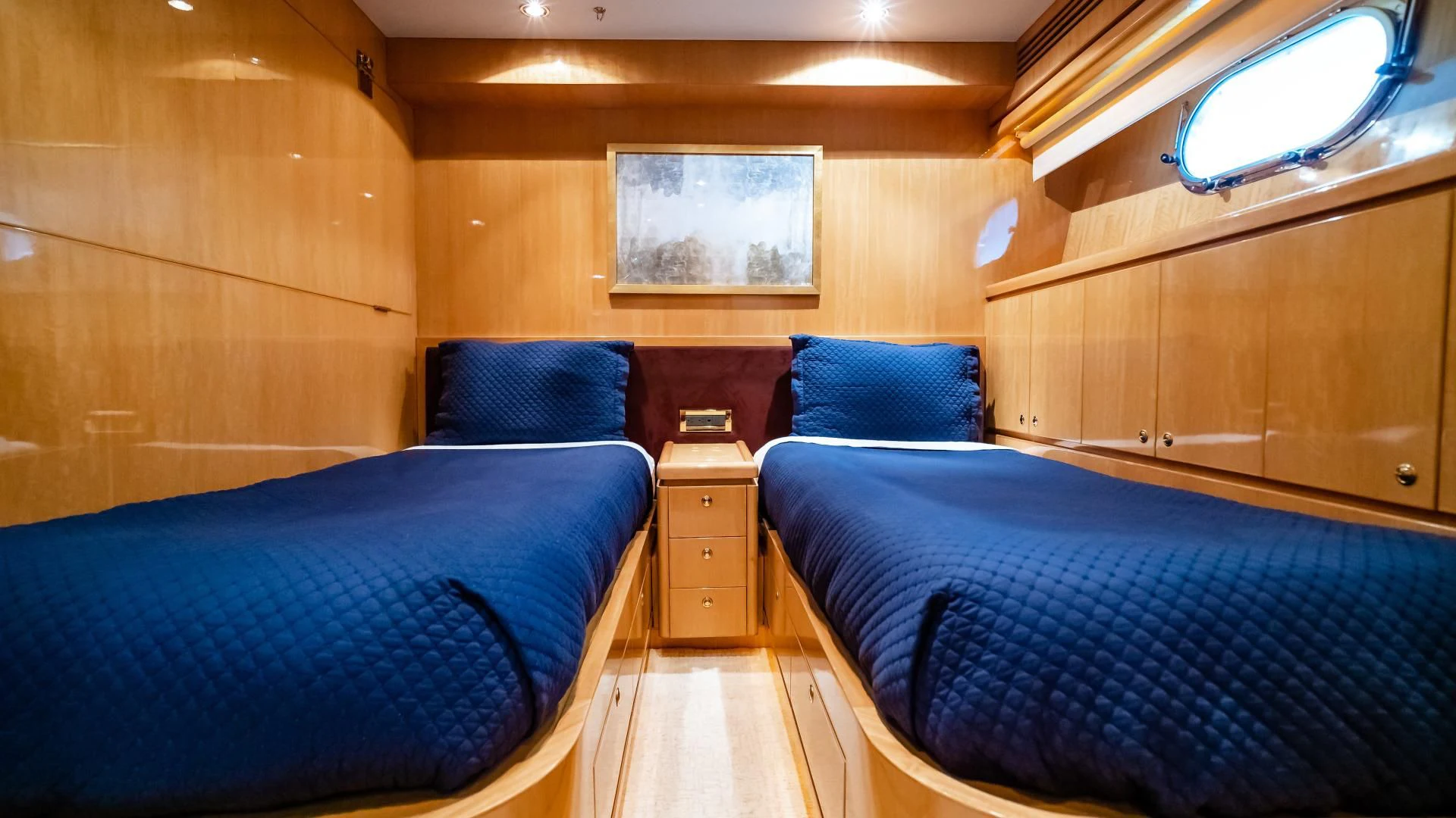 a room with two beds aboard VITESSE Yacht for Sale