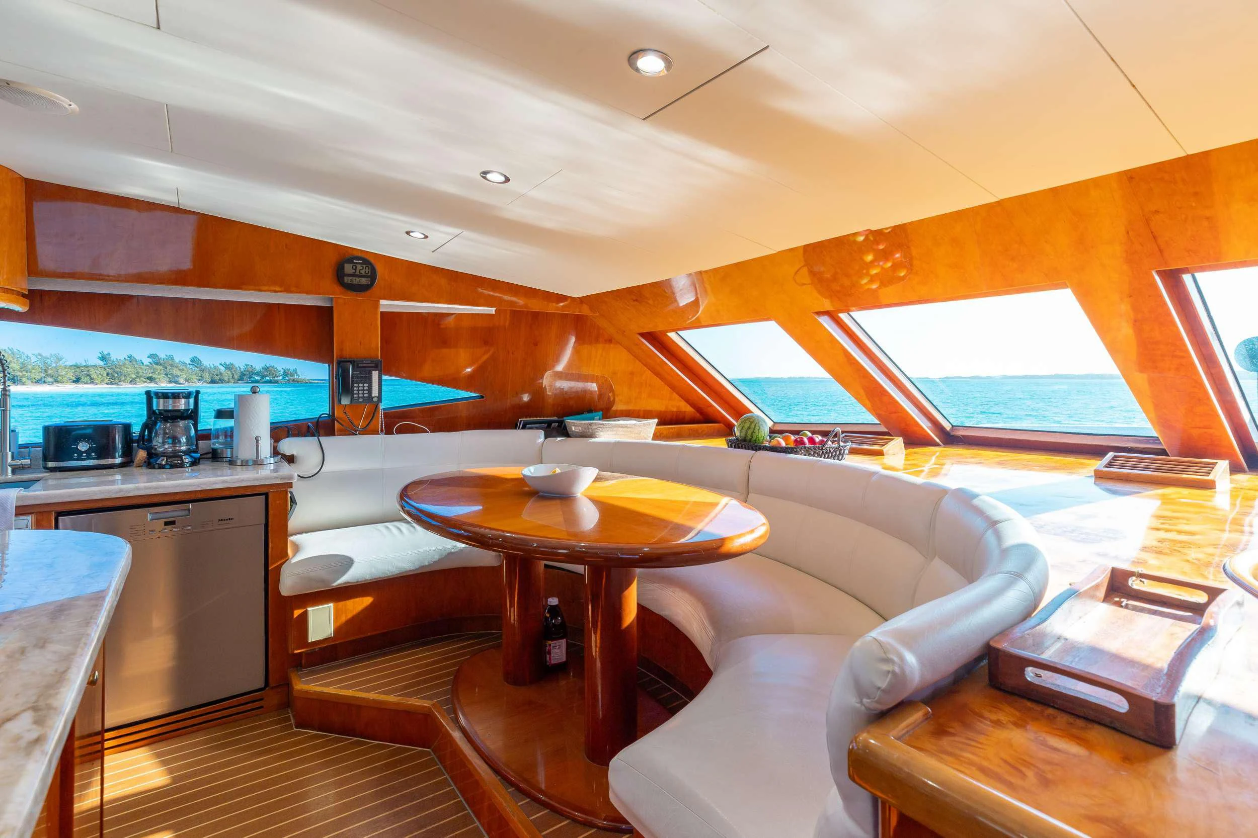 a modern looking kitchen and living room aboard VITESSE Yacht for Sale