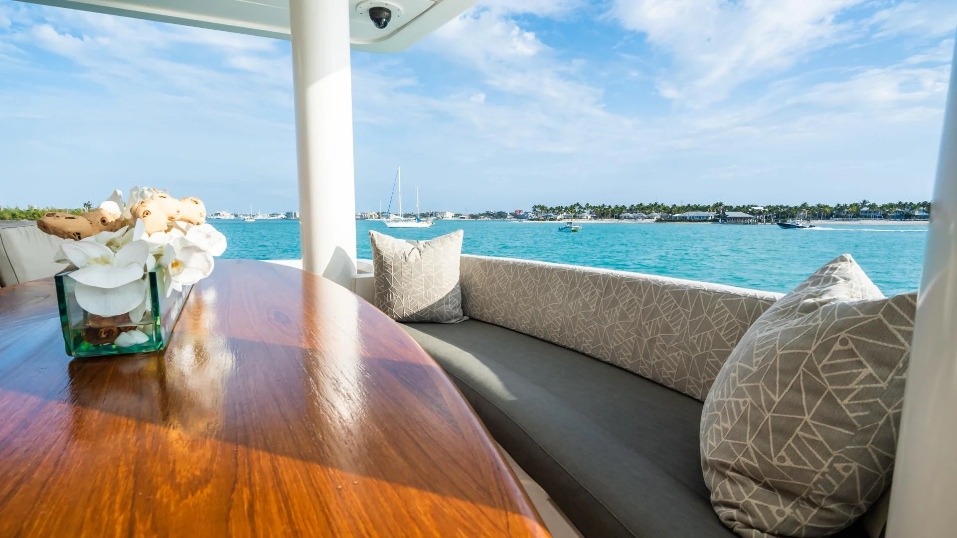 a table with pillows on it aboard VITESSE Yacht for Sale