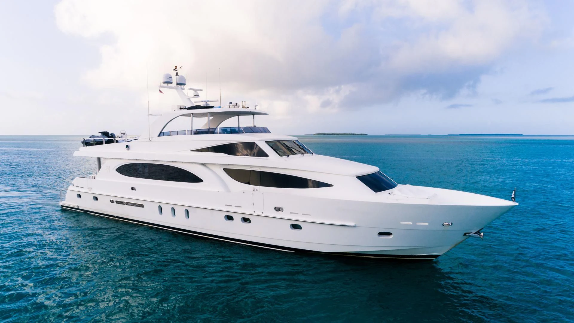a white yacht in the water aboard VITESSE Yacht for Sale