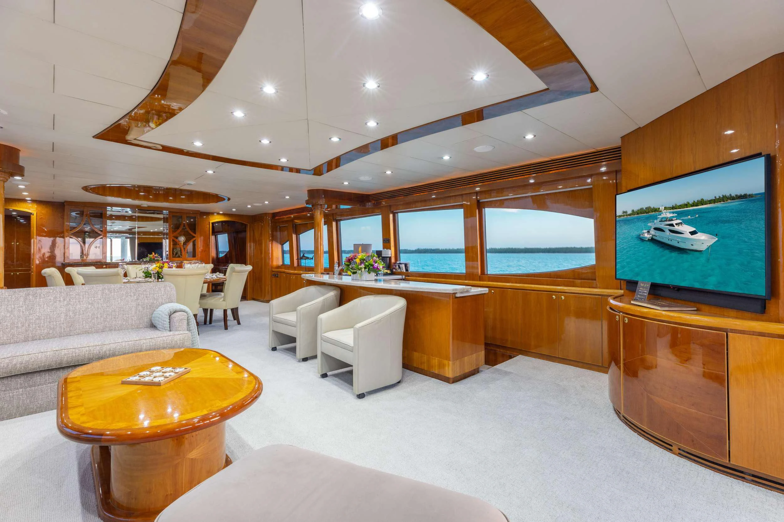 a living room with a large screen aboard VITESSE Yacht for Sale