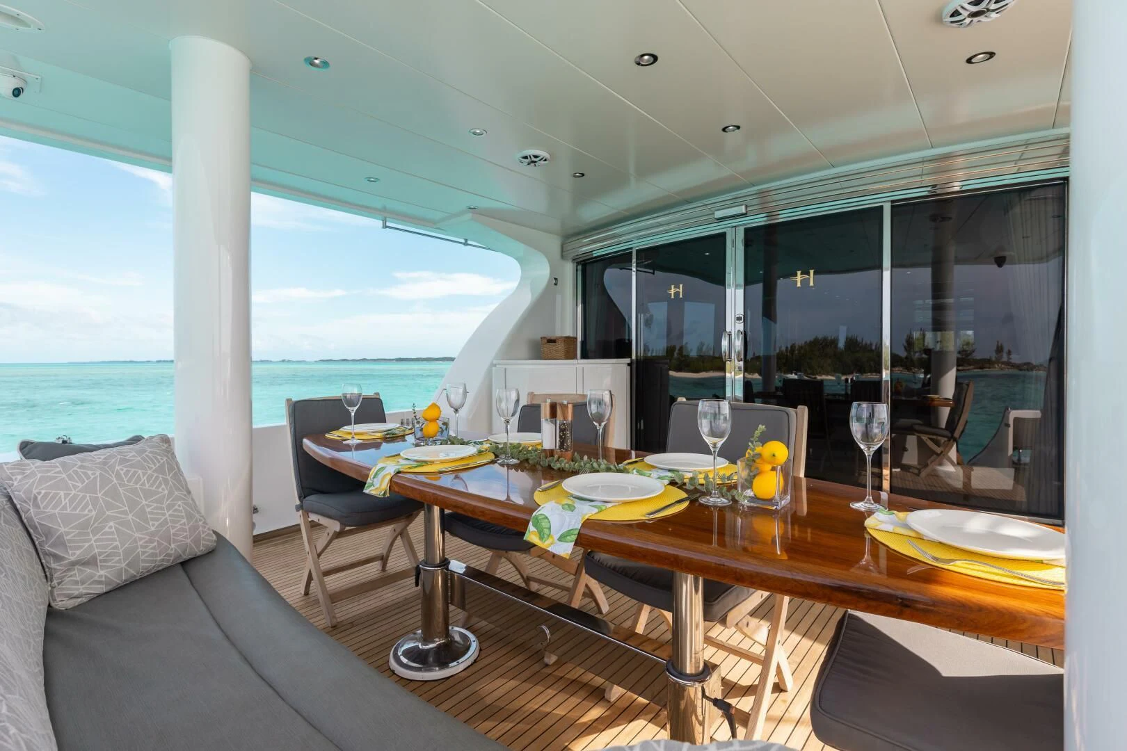 a room with a table and chairs aboard VITESSE Yacht for Sale