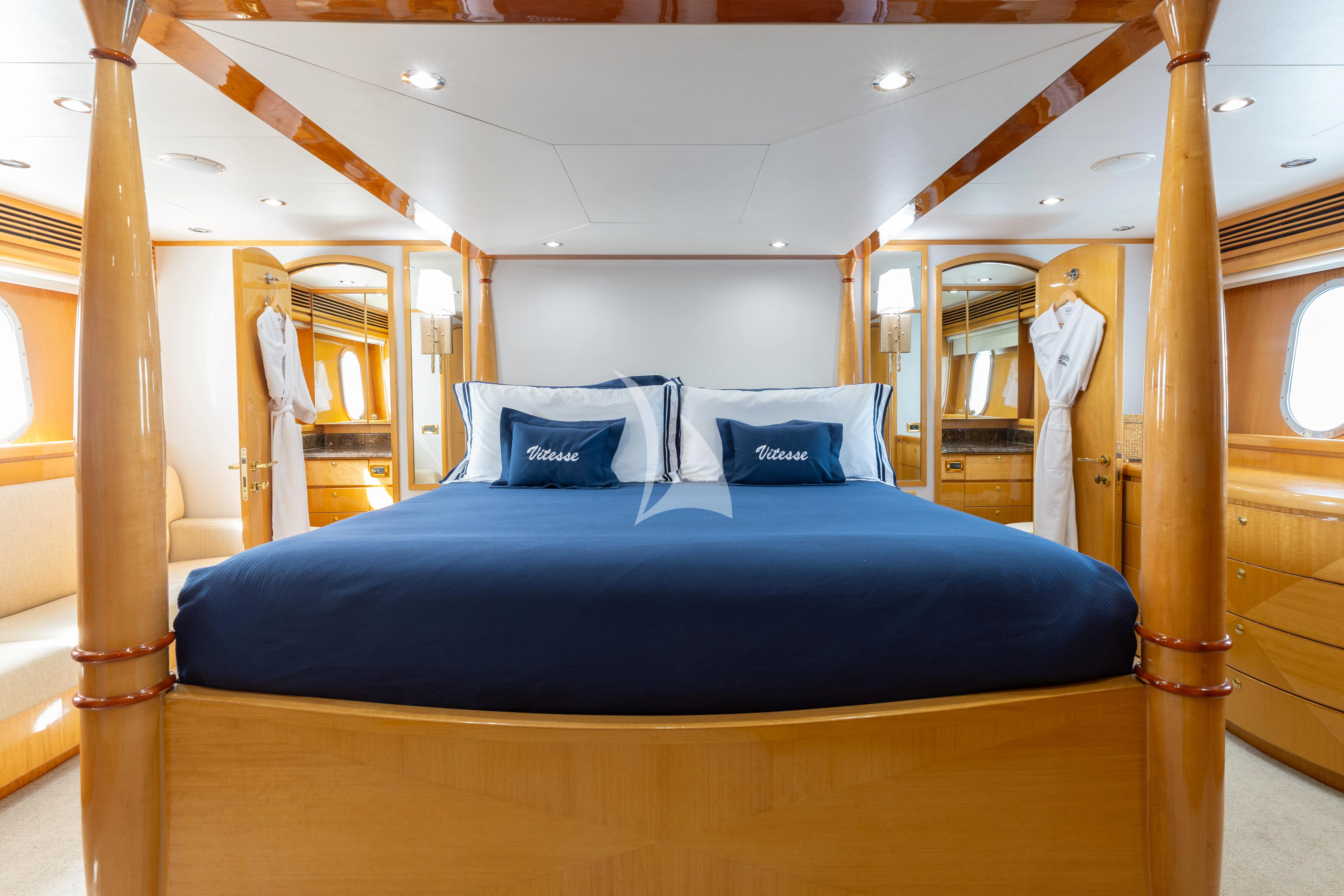 a bed in a room aboard VITESSE Yacht for Sale