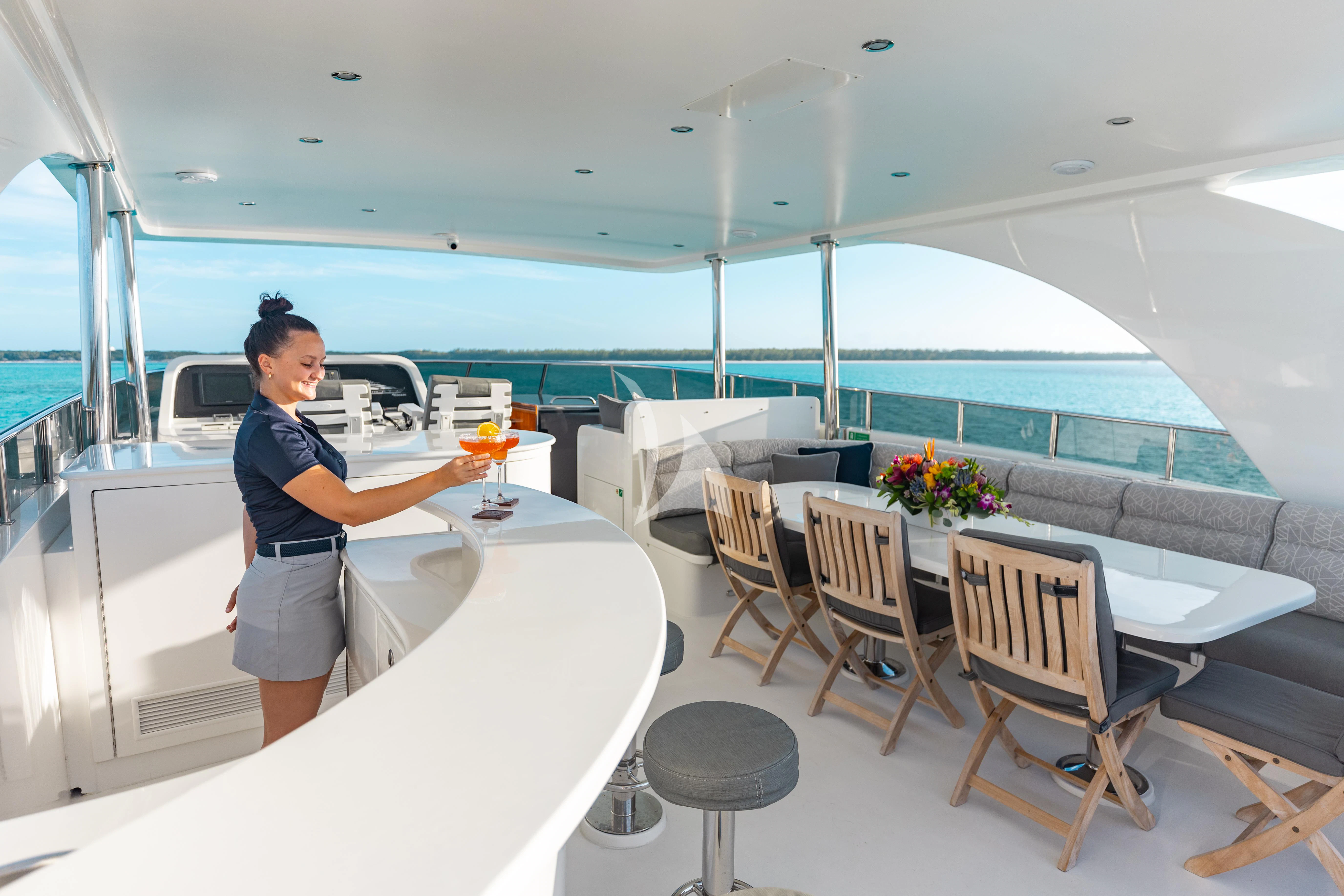 a person standing on a balcony aboard VITESSE Yacht for Sale
