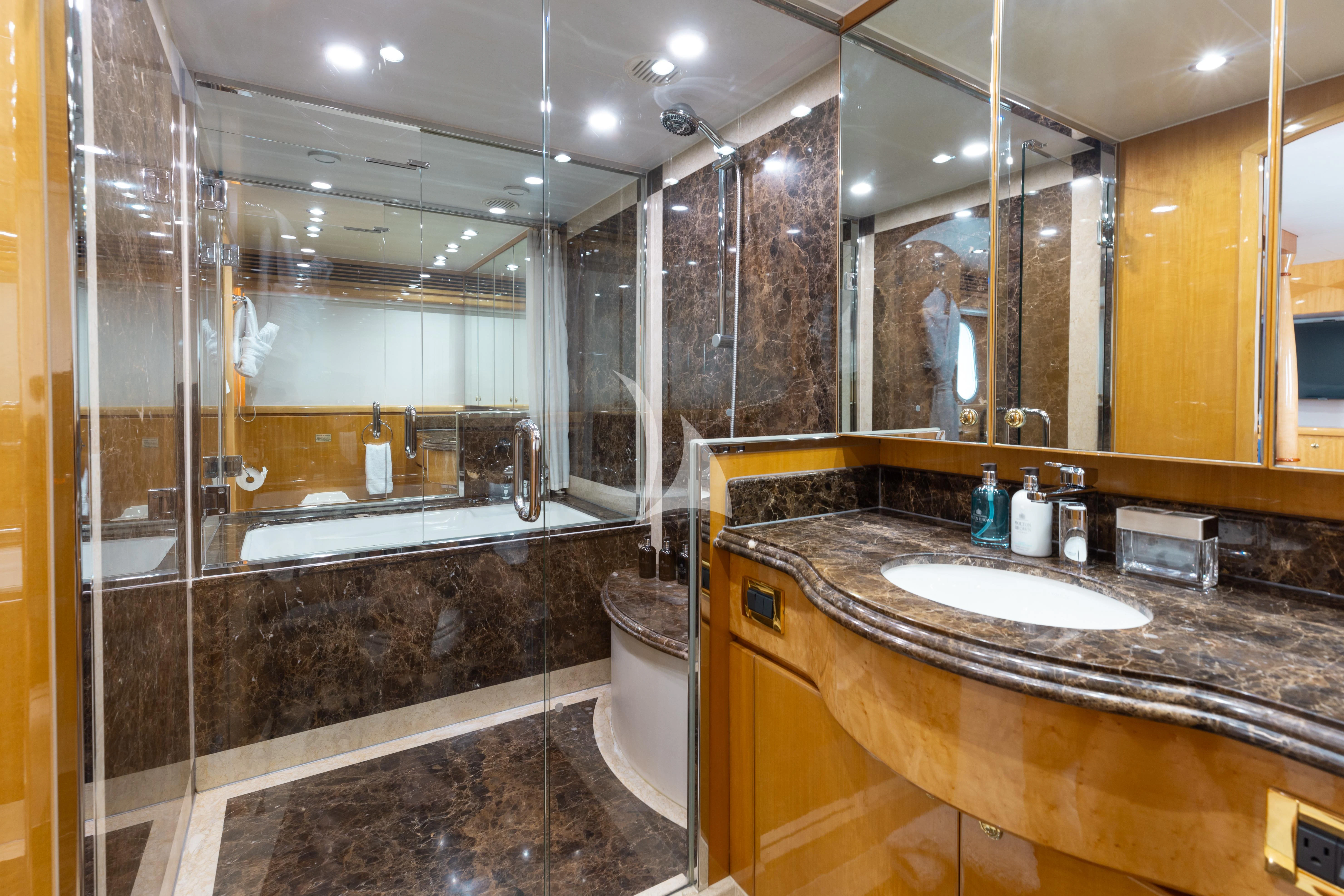 a bathroom with a large mirror aboard VITESSE Yacht for Sale