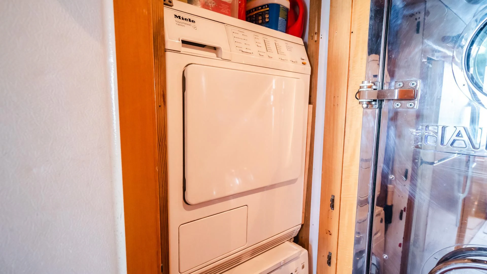 a white refrigerator in a kitchen aboard VITESSE Yacht for Sale