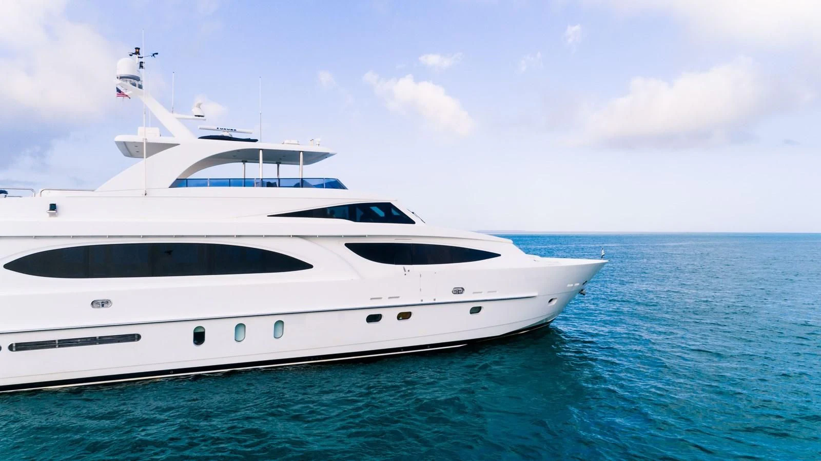 a white yacht in the water aboard VITESSE Yacht for Sale