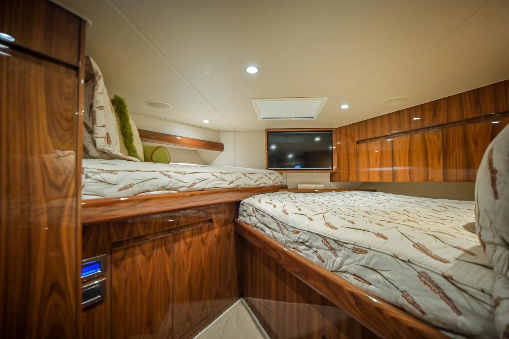 a bedroom with a bed and a television aboard GALATI  TRADE Yacht for Sale