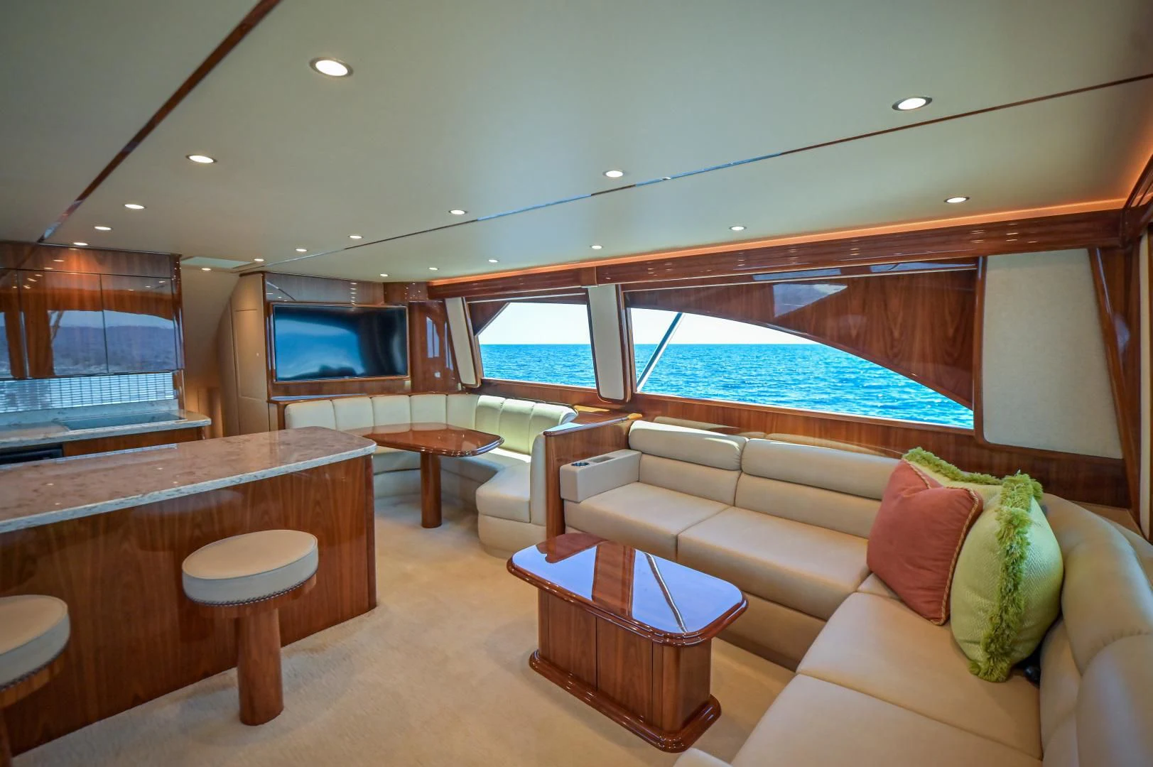 a room with a couch and a table and a television aboard GALATI  TRADE Yacht for Sale