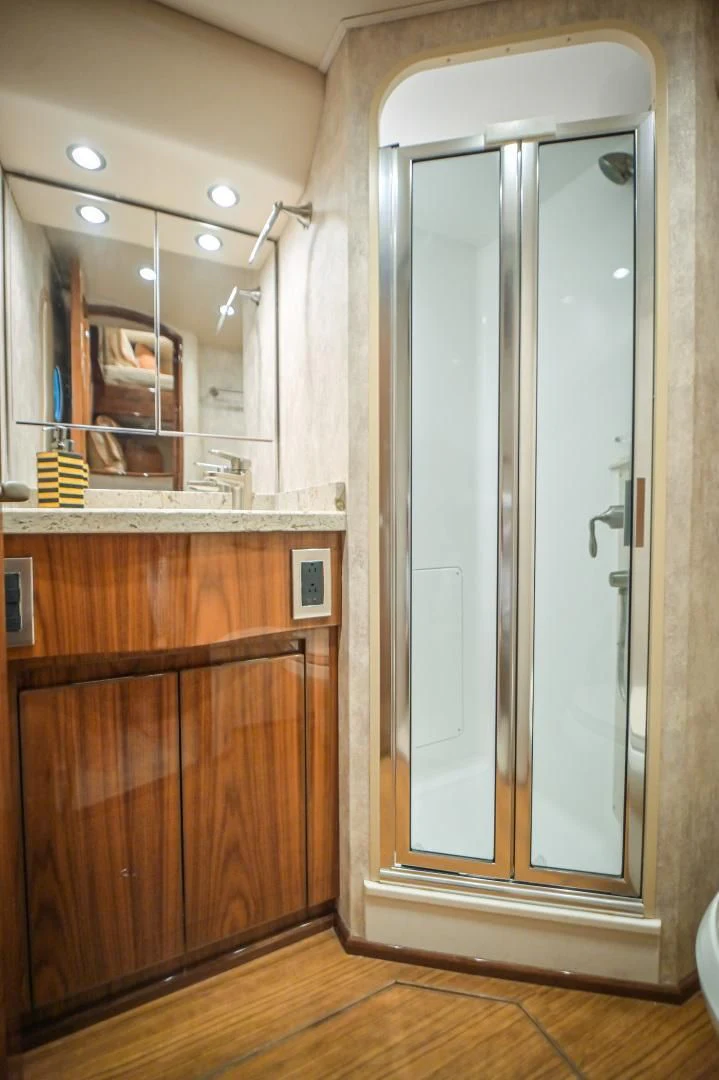 a bathroom with a large mirror aboard GALATI  TRADE Yacht for Sale