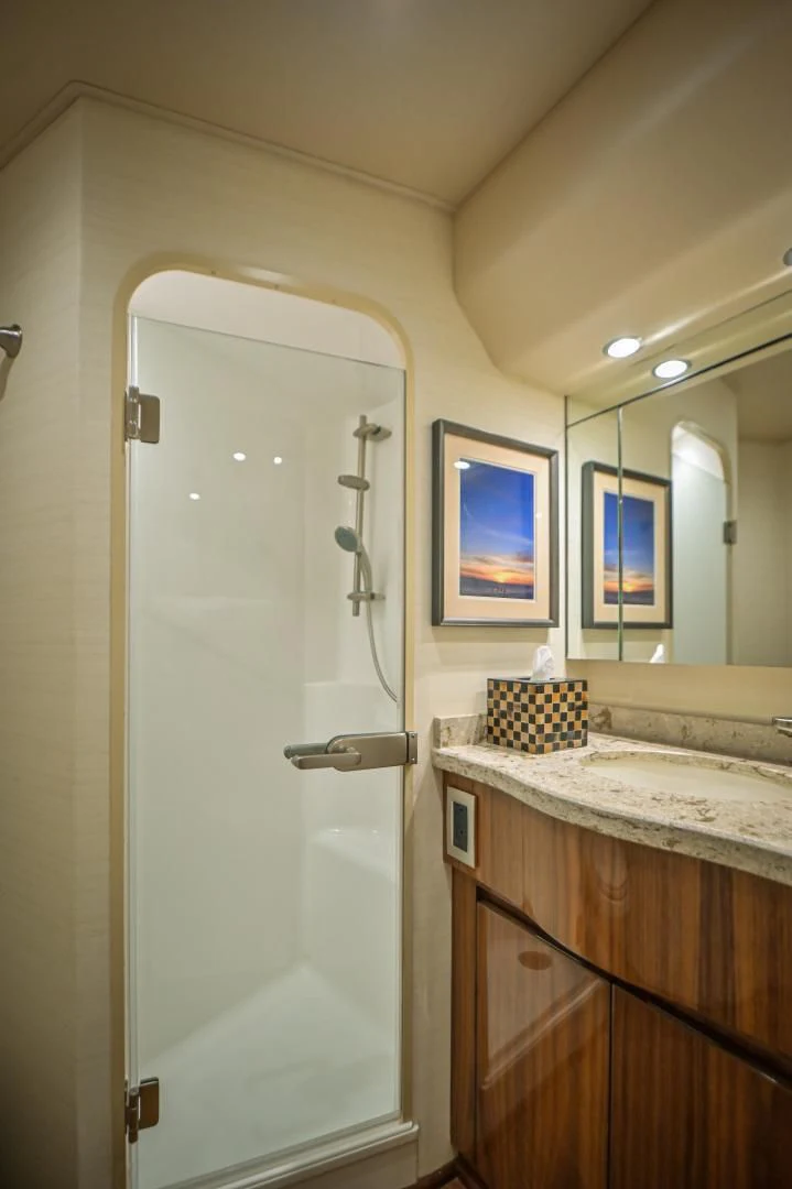 a bathroom with a shower and sink aboard GALATI  TRADE Yacht for Sale